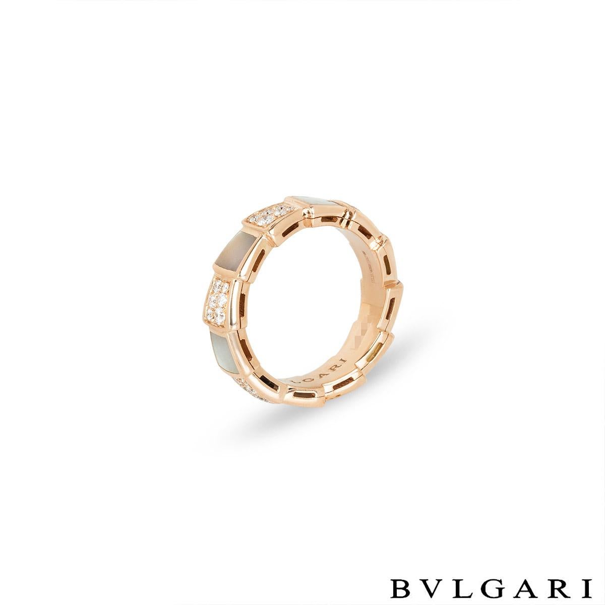 A glamorous 18k rose gold mother of pearl and diamond ring by Bvlgari from the Serpenti collection. The Serpenti Viper ring coils around the finger, comprising of 6 alternating mother of pearl inlay stations and 6 diamond pave set stations. There