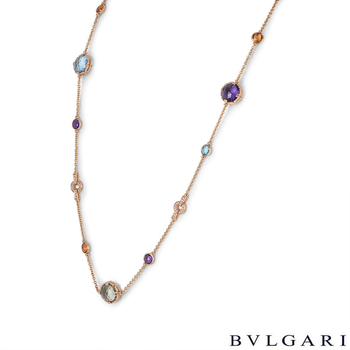 A stunning 18k rose gold diamond and multi-gem necklace by Bvlgari from the Parentesi collection. The necklace comprises of 5 round rose cut topaz stones, 5 round rose cut amethyst stones, 4 round rose cut citrine stones, 2 round rose cut green