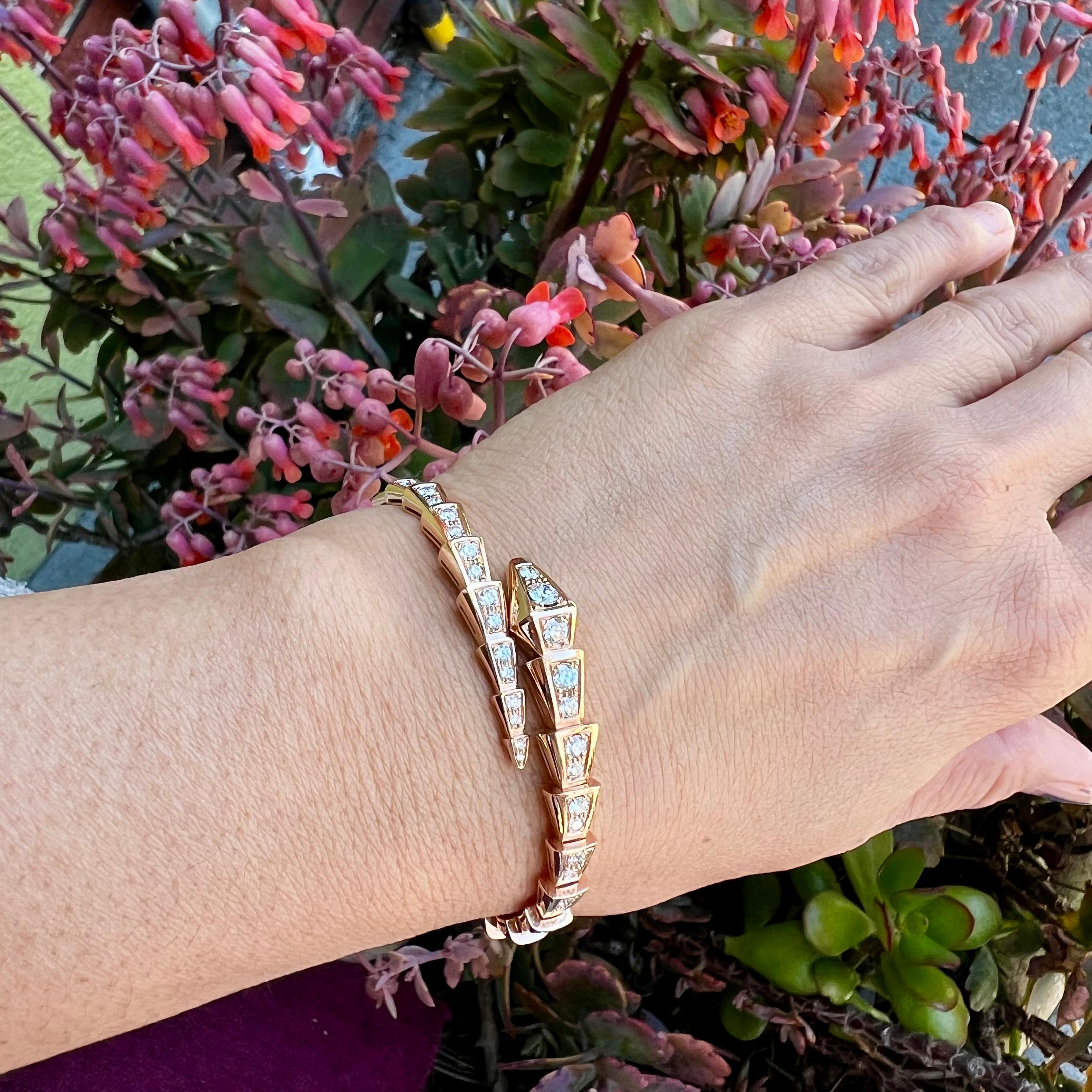 This beautiful serpent bracelet is 18 Karat rose gold has 2.80 carats of VS1 F color diamonds...58 total.  Part of Bvlgari's iconic Serpenti collection representing wisdom, vitality, and seduction. The Bvlgari Serpenti Viper one-coil slim bracelet