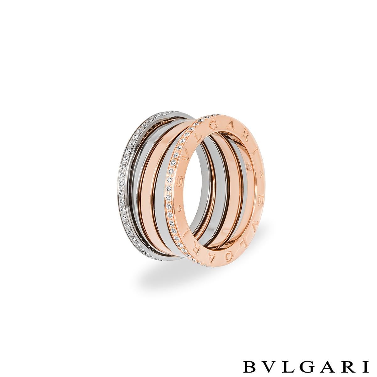 A striking 18k rose and white gold diamond ring by Bvlgari from their Labyrinth B.Zero1 collection. The ring comprises of the signature spirals, alternating between rose and white gold and accompanied by a diamond set border. There are 108 round