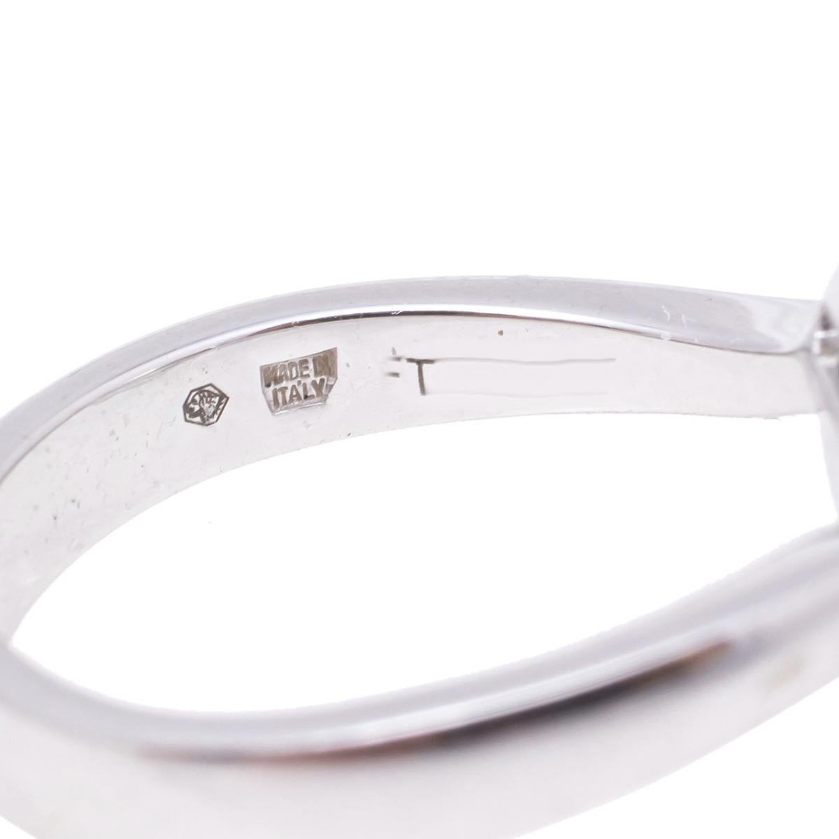 It is definitely love-at-first-sight with this Bvlgari ring. Beautifully crafted from 18k white gold into a slender band that holds a notable topaz at the center in a four-prong setting. Wear this gorgeous creation to add a luxe accent to your
