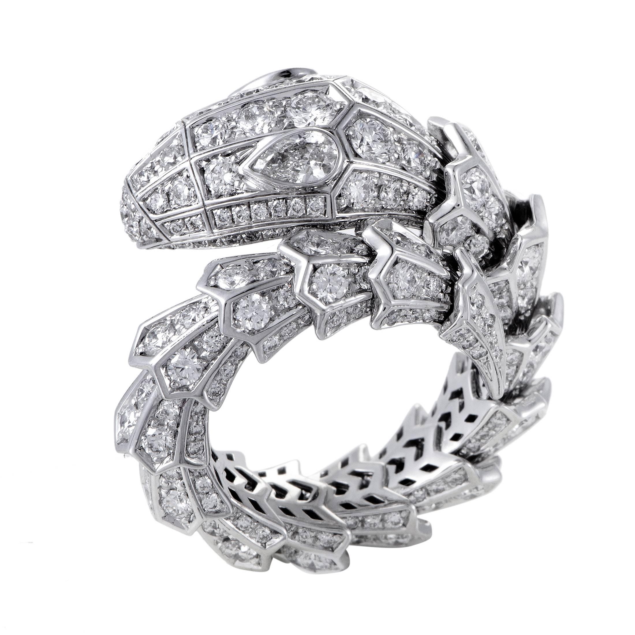 This decadent design from Bvlgari's Serpenti collection shines with a vivacious and lavish glow. The ring is made of 18K white gold and is set with a full diamond pave that weighs 3.72ct in total. Ring Top Dimensions: 25mm x 18mm