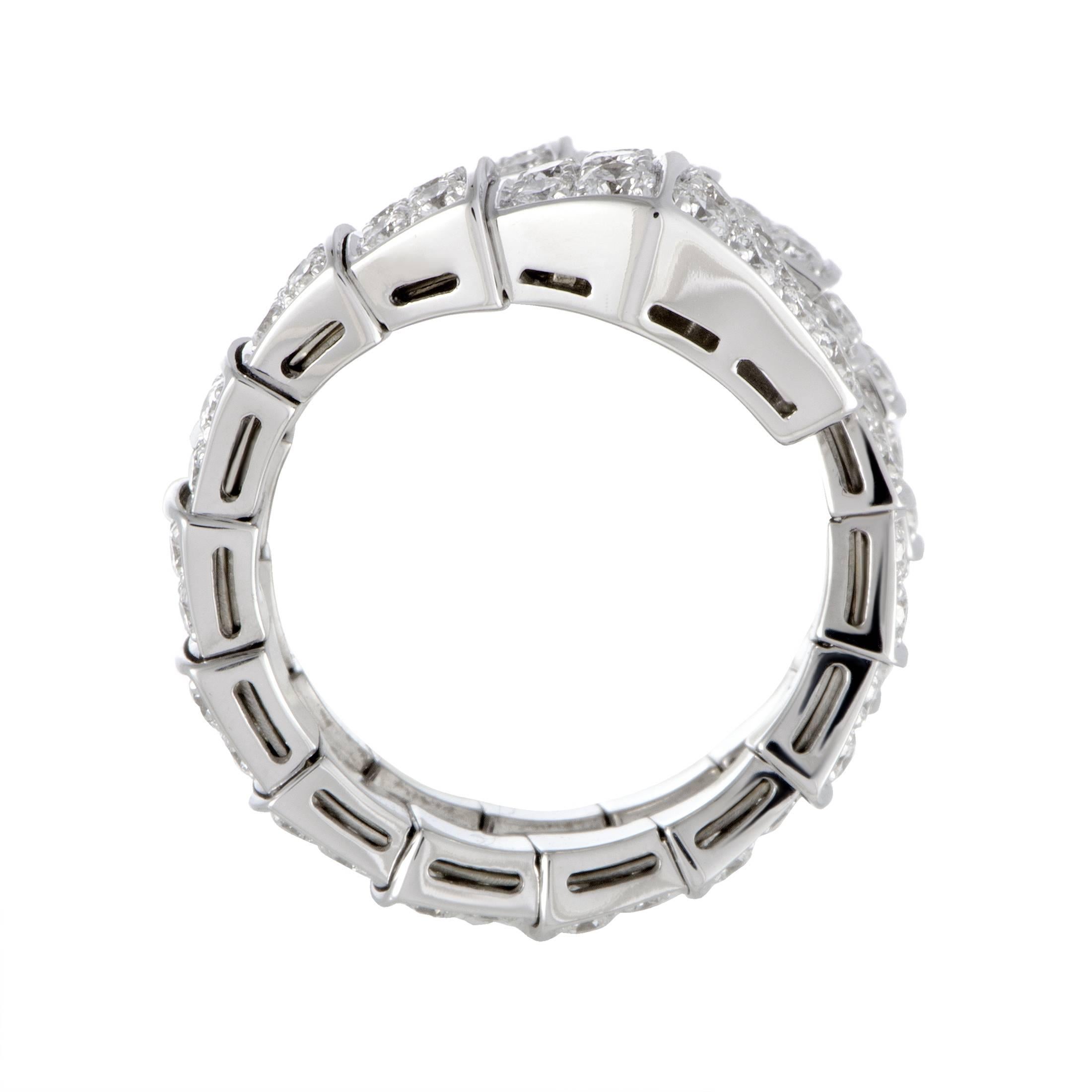 Coiling around your finger in an alluringly graceful manner, this Bvlgari ring offers an exceptionally elegant, prestigious appearance. The ring is made of gleaming 18K white gold and paved with scintillating diamonds that weigh in total 2.85