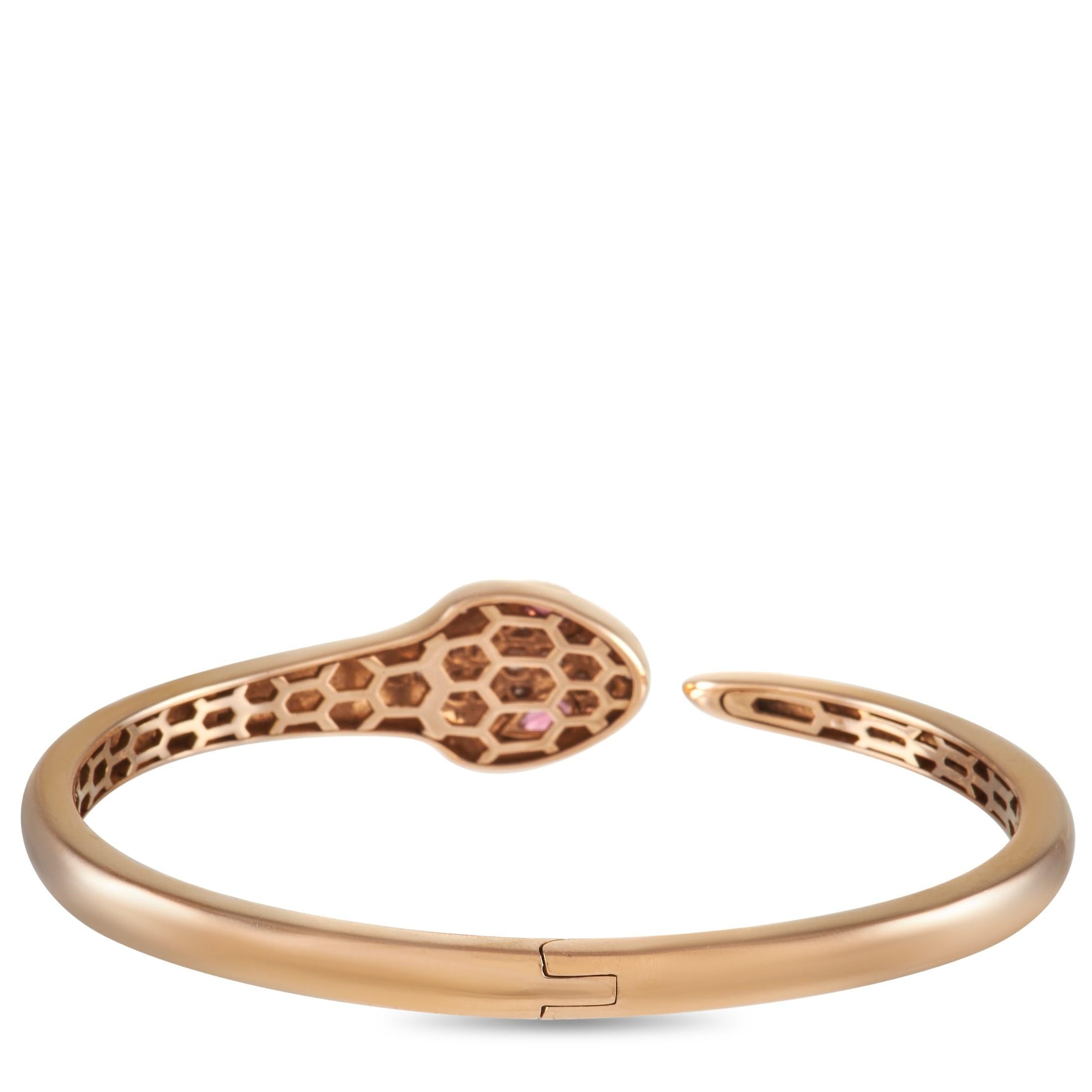 From Bvlgari's Serpenti Collection is this rose gold bangle bracelet sculpted to form a snake silhouette. The 
