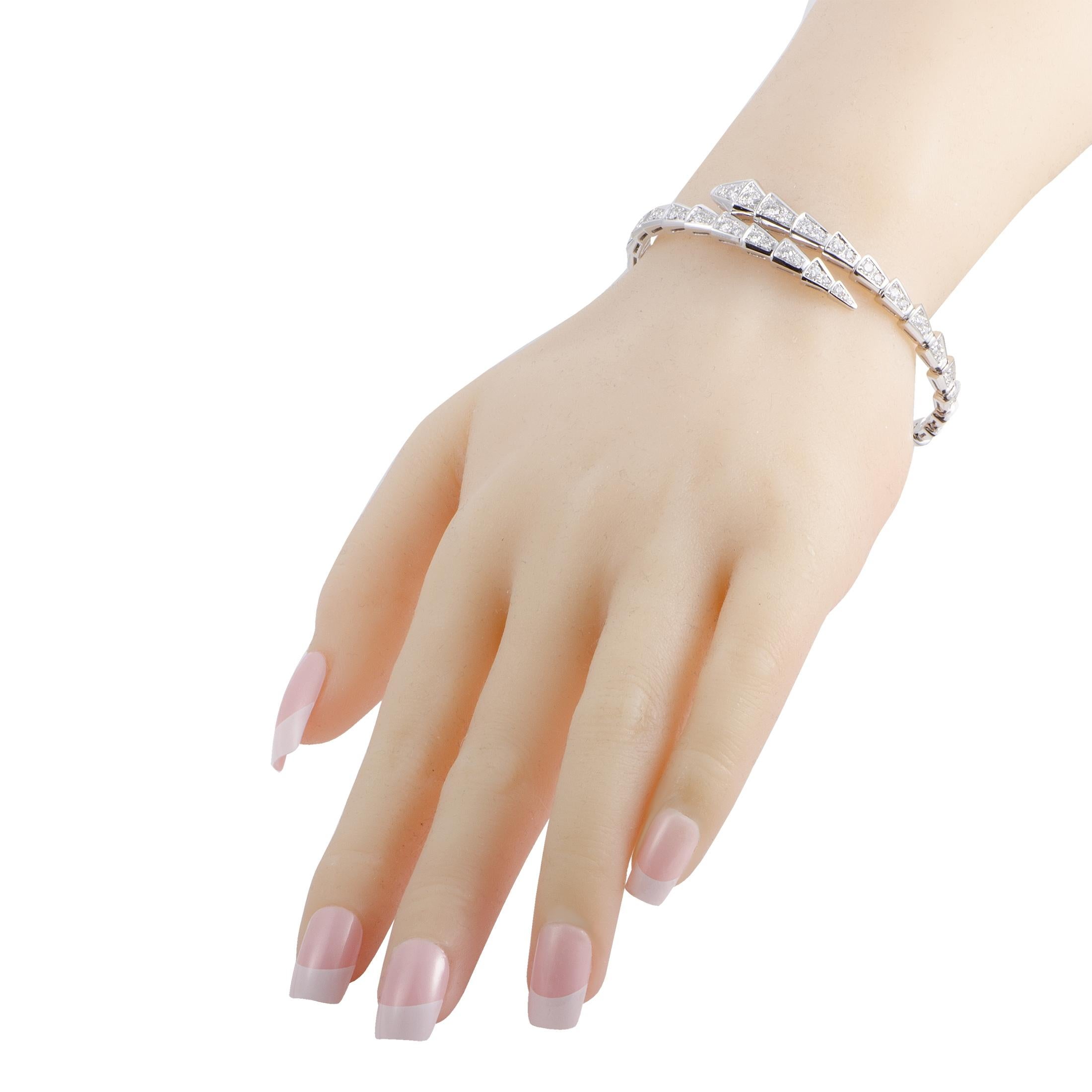 Presented within the renowned “Serpenti” collection, this sublime Bvlgari bracelet features an incredibly attractive, fashionable design. The bracelet is made of elegant 18K white gold and lavishly decorated with gorgeous diamond stones.