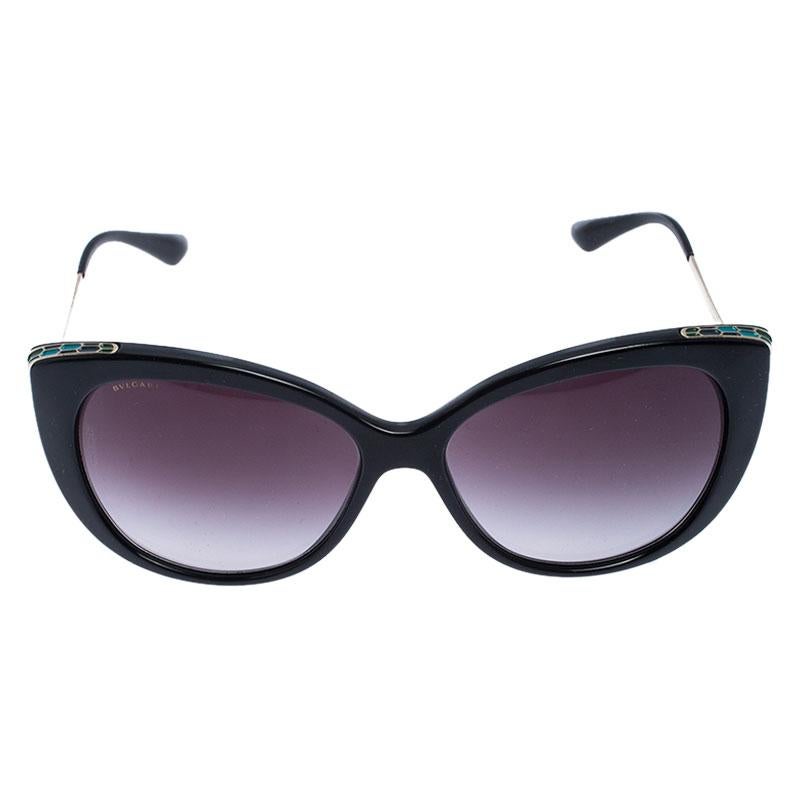 The stylish frame sculpted in black acetate into a cat-eye shape and Serpenti accents on the sides, make these sunglasses a high-fashion accessory that you must own. From the house of Bvlgari, they will look best with your daytime statement