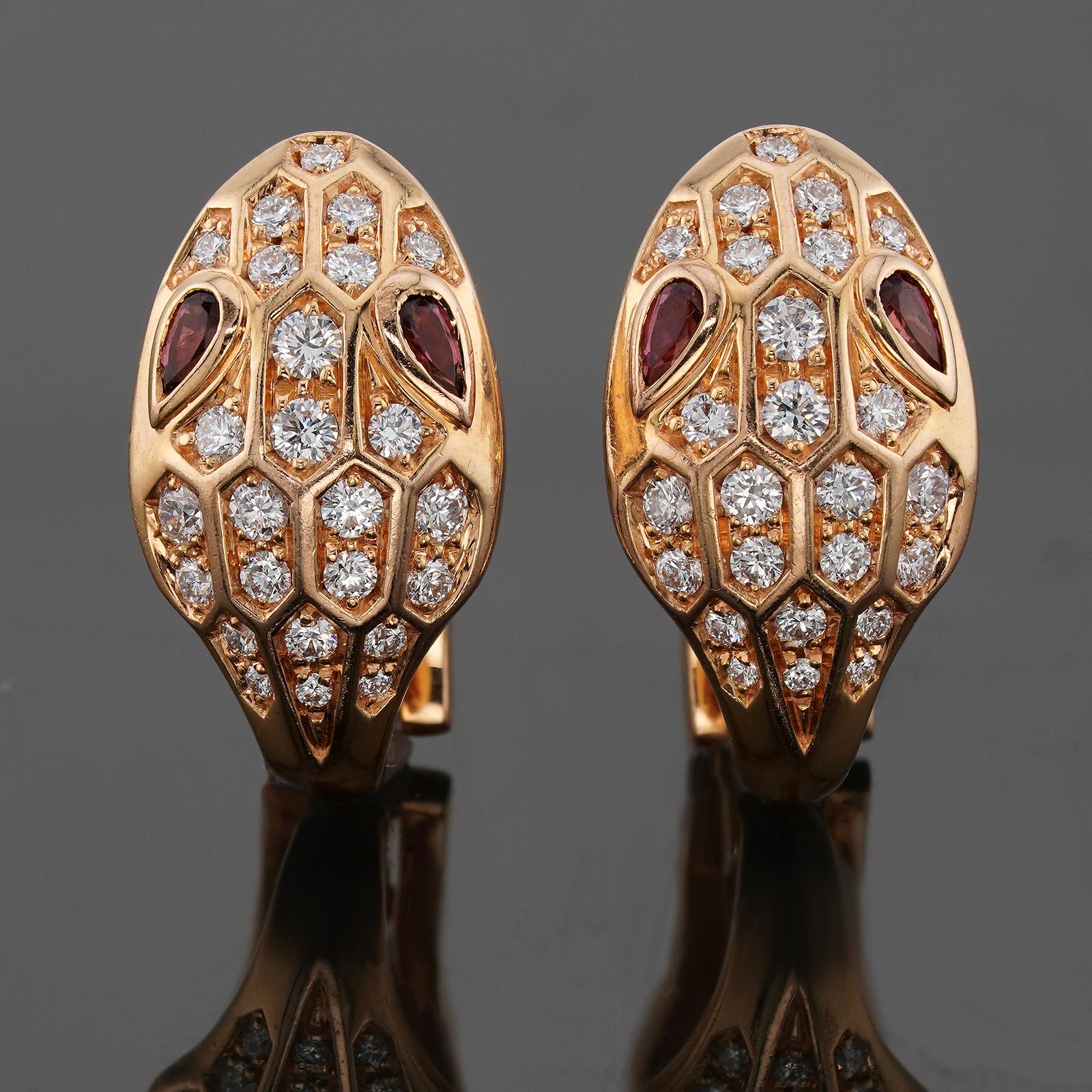 These fabulus Bvlgari wrap earrings from the alluring Serpenti collection are crafted in 18k rose gold and set with rubellites and round brilliant E-F-G VVS1-VVS2 diamonds weighing an estimated 1.10 carats. Made in Italy circa 2020s. Measurements: