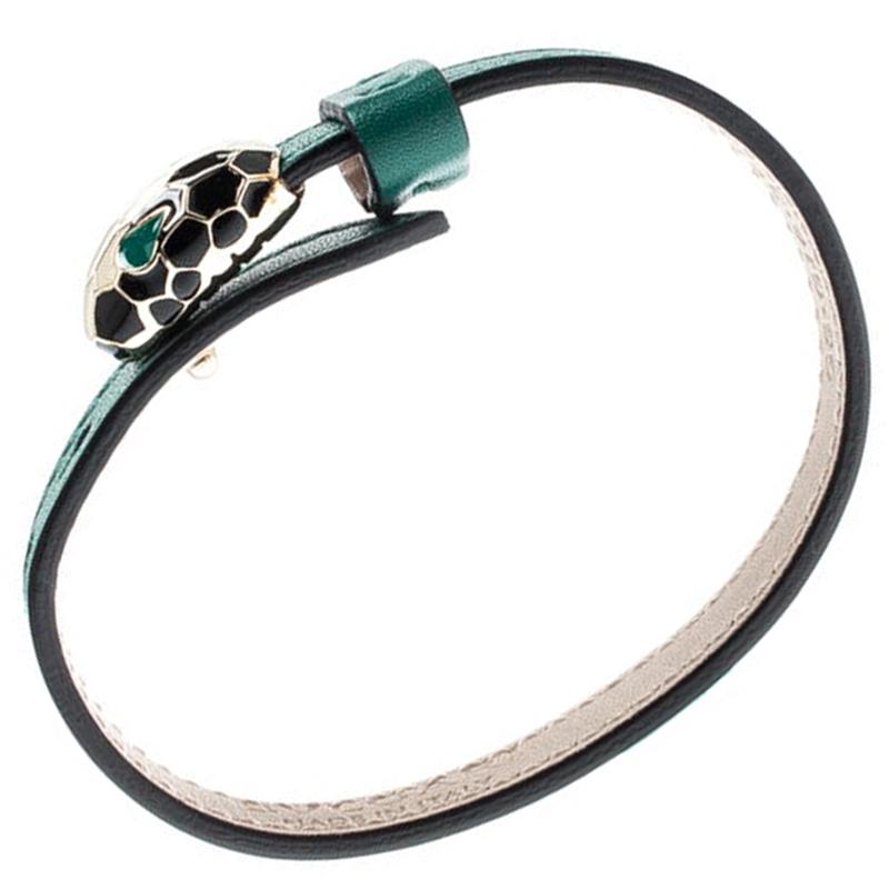 This wonderfully designed bracelet by Bvlgari will exude beauty every time it sits around your wrist. Subtly crafted with green leather, the bracelet is beautified by a Serpenti head made from gold-plated metal and enamel. It is a design that will