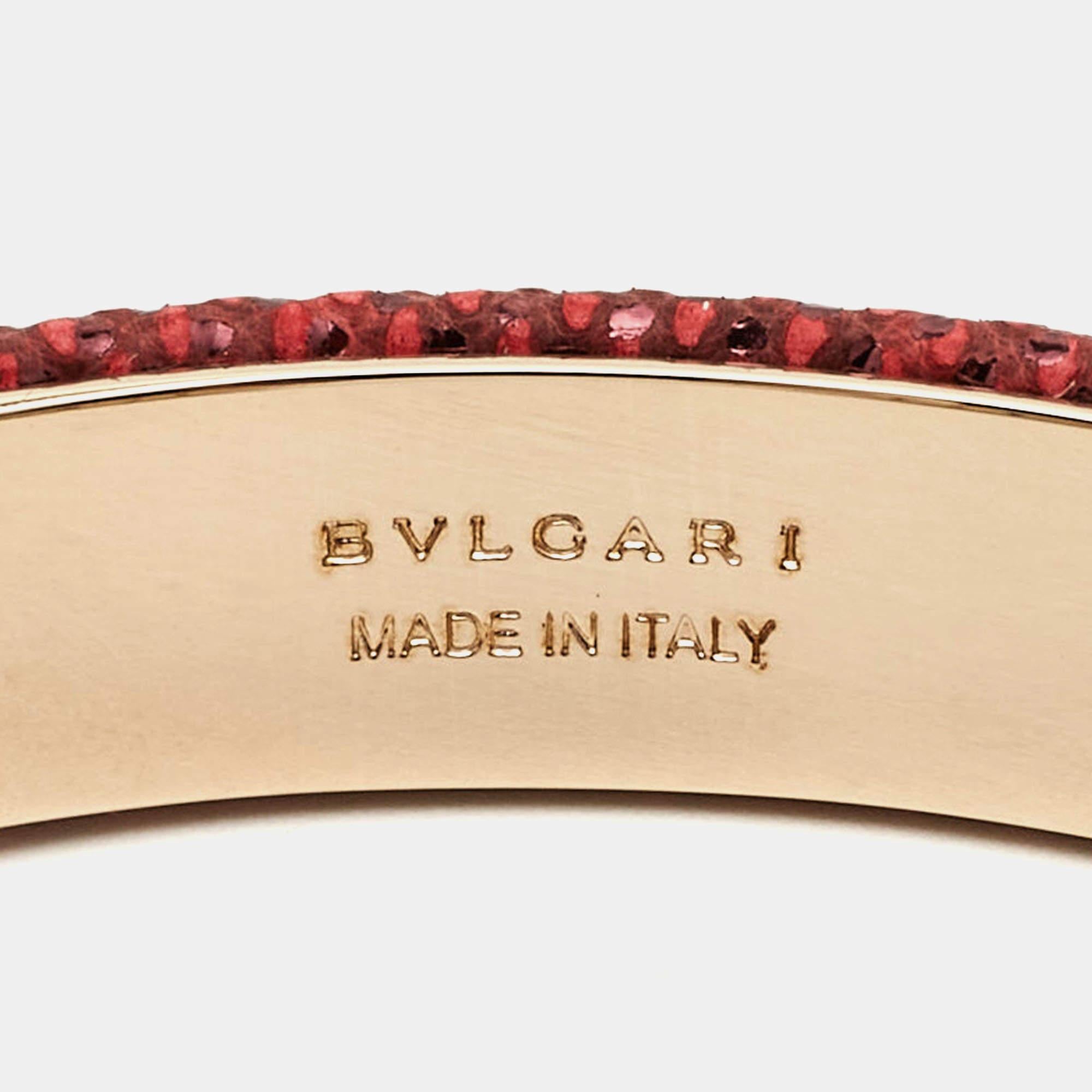 This iconic Bvlgari Serpenti Forever bracelet is finely crafted in enamel and snakeskin leather. It has an open-cuff shape with decorative snake heads on its tips.

Includes: Original Box, Authenticity Card, Info Booklet