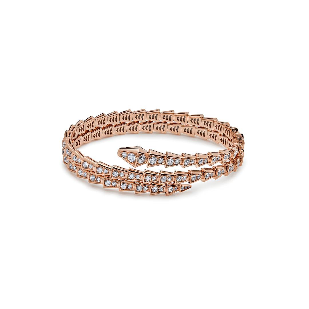 Crafted from 18-karat rose gold and adorned with pavé diamonds, this Bulgari Serpenti Viper Two-Coil Bracelet exudes elegance and sophistication. Perfect for those who appreciate contemporary style, the Serpenti Viper bracelet with a total carat