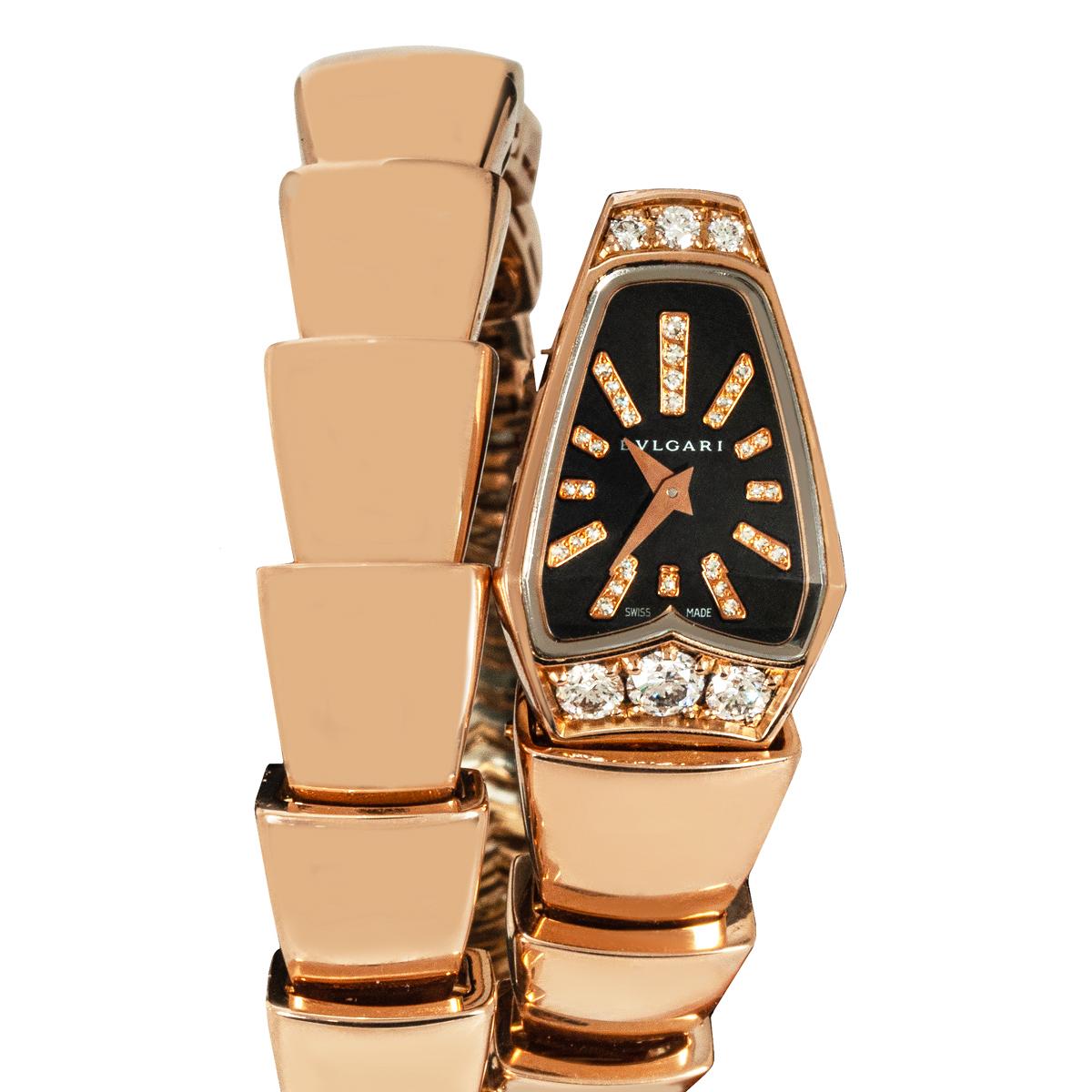 A rose gold Serpenti by Bvlgari. Features a black dial with each hour marker diamond-set. At 12 and 6 o'clock of the case is a total of 6 round brilliant cut diamonds. Fitted with a sapphire crystal and quartz movement. The flexible snake-style rose