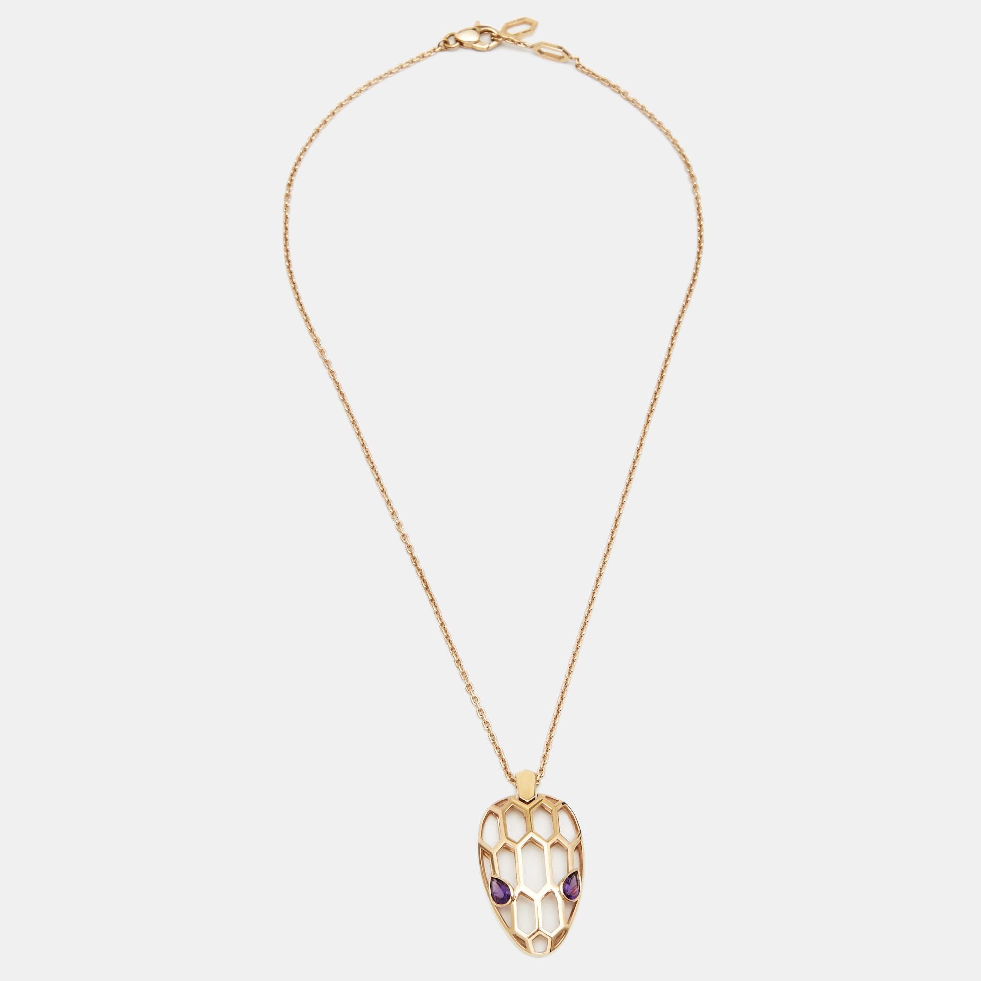 The iconic Serpenti designs from the house of Bvlgari can now be paired with your special looks with effortless glam. This 18k rose gold Seduttori necklace features a sleek & intricately crafted Serpenti head pendant adorned with Amethyst stones as