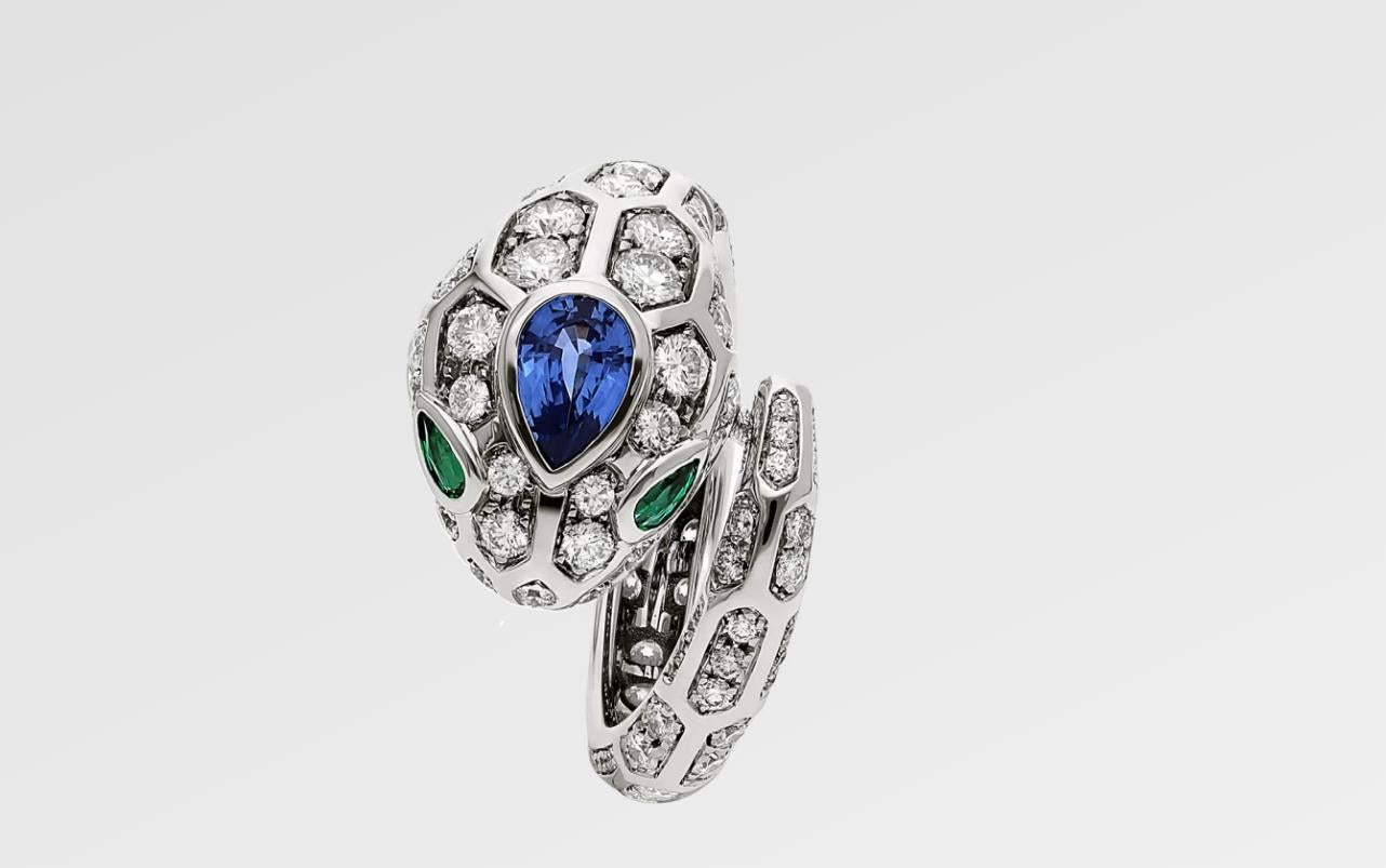 Bvlgari Serpenti Seduttori Snake Ring
The ring is 18K 750 White Gold
There are 1.35 Carats F VVS White Diamonds
There are 0.09 Carats in Green Emeralds
There is 0.20 Carats in Blue Sapphire
The ring is a size 55 or 7.25, not sizable
The ring weighs