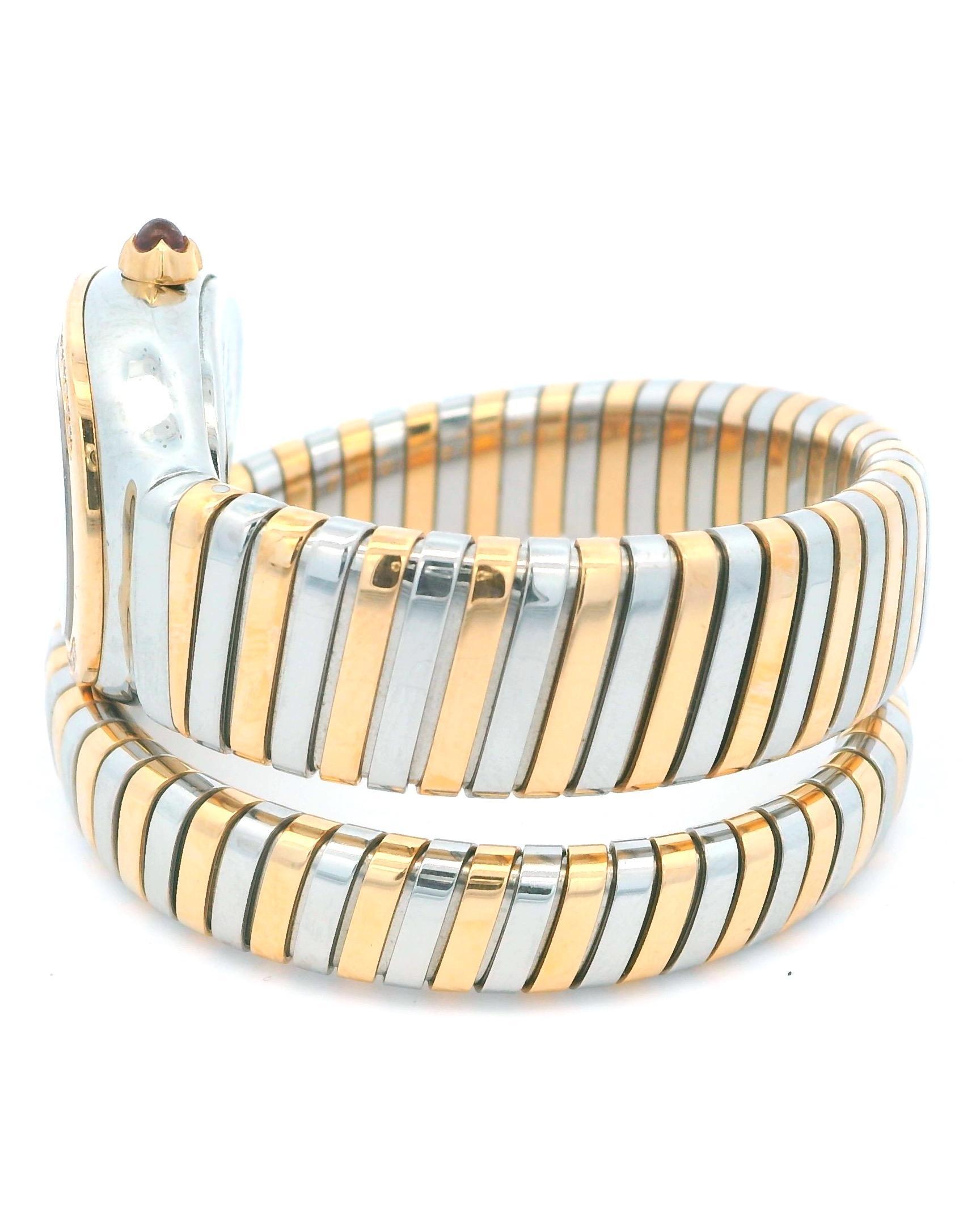 Bvlgari Serpenti Tubogas SP35SPG ladies watch. 35MM stainless steel case with 18K rose gold & factory diamonds set bezel. White dial with rose gold hands and index and Roman numeral hour marker. Tubogas , 18K rose gold & stainless steel, single