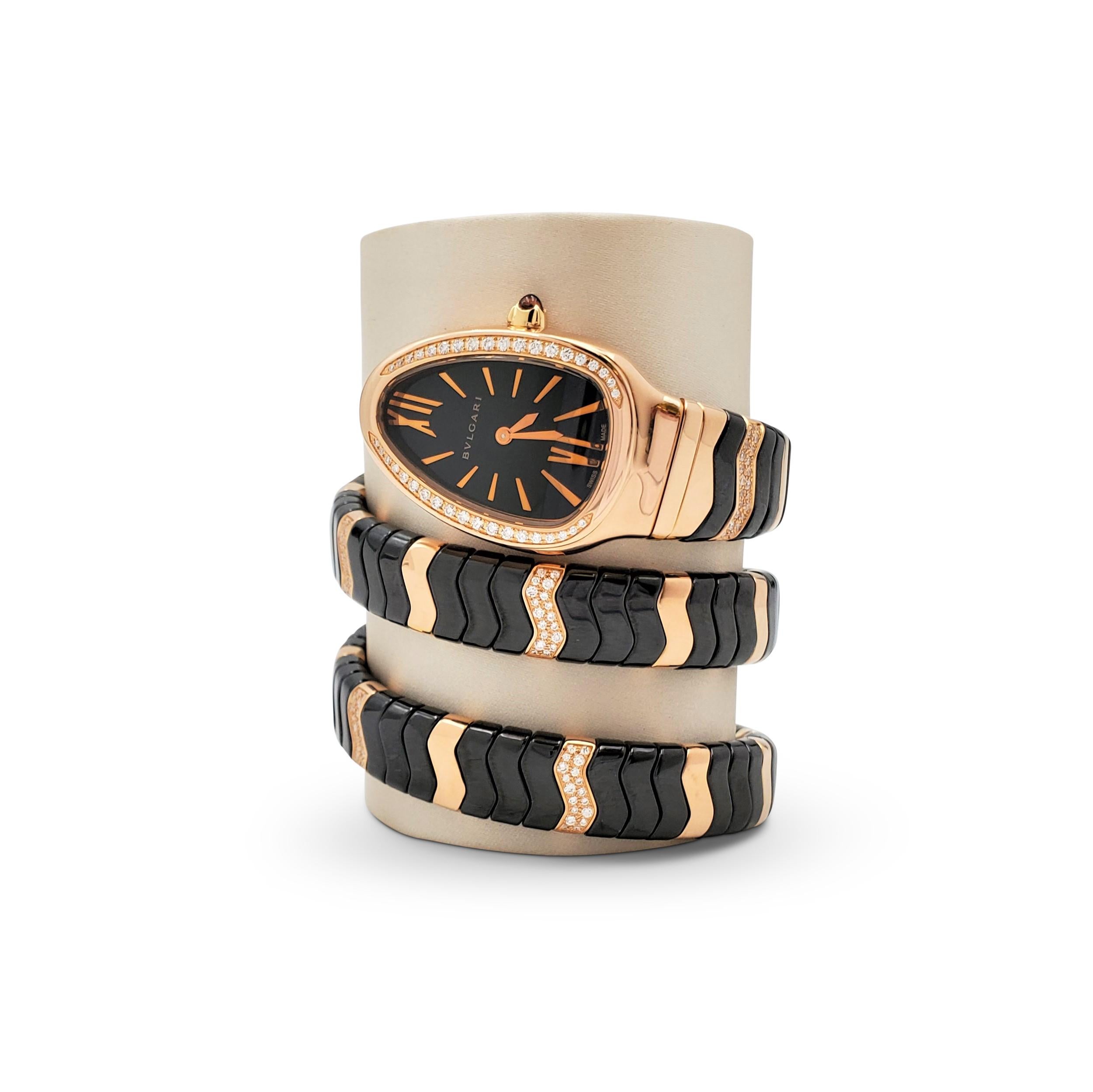 Authentic Bvlgari 'Serpenti Spiga' double spiral watch. The 33mm curved black ceramic case imitates the head of a snake and is completed by an 18 karat rose gold bezel set with round brilliant cut diamonds. A slick black lacquered dial is