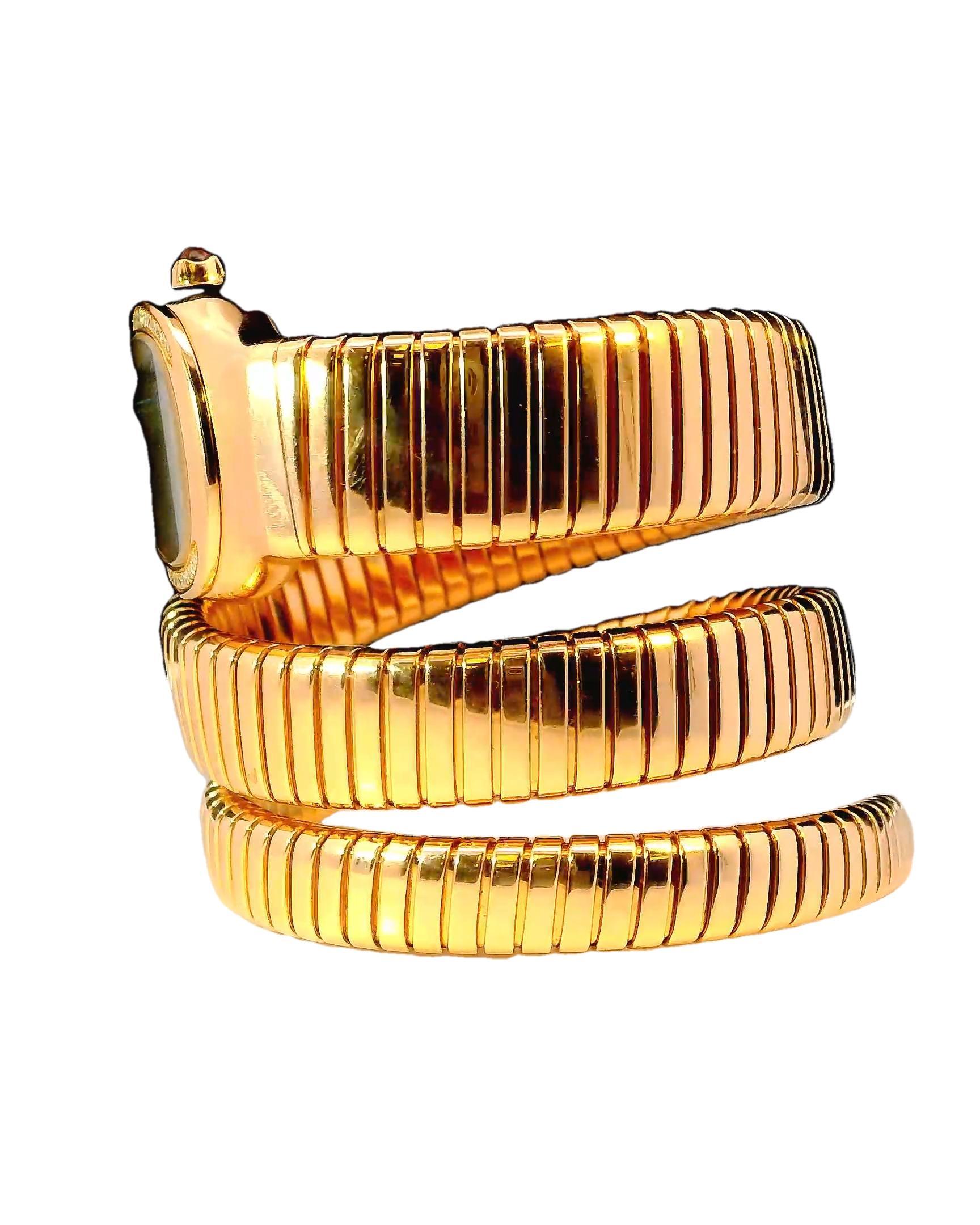 Circa 2020.

This exquisite Bvlgari watch features a distinctive serpentine design, crafted in 18k rose gold. The coiled bracelet is composed of articulated sections, each polished to a high shine, creating a fluid, wrap-around effect.

The watch