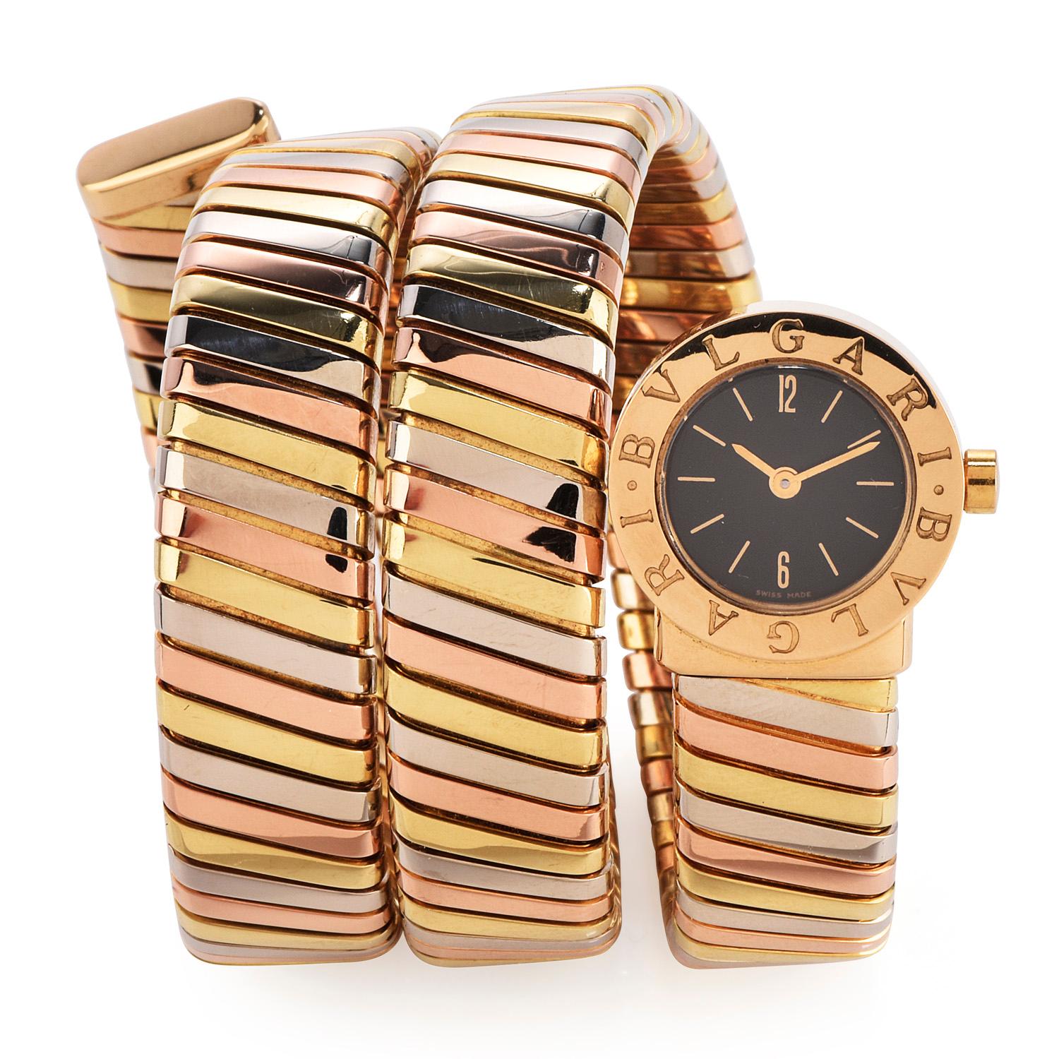 This 1990's Serpenti Tubogas Watch Designed by Bvlgari France offers flexibility and the perfect complement for any ensemble.

Crafted in pure 150.7 grams of 18K rose, white, and yellow gold.

This quartz movement watch features a black tone dial