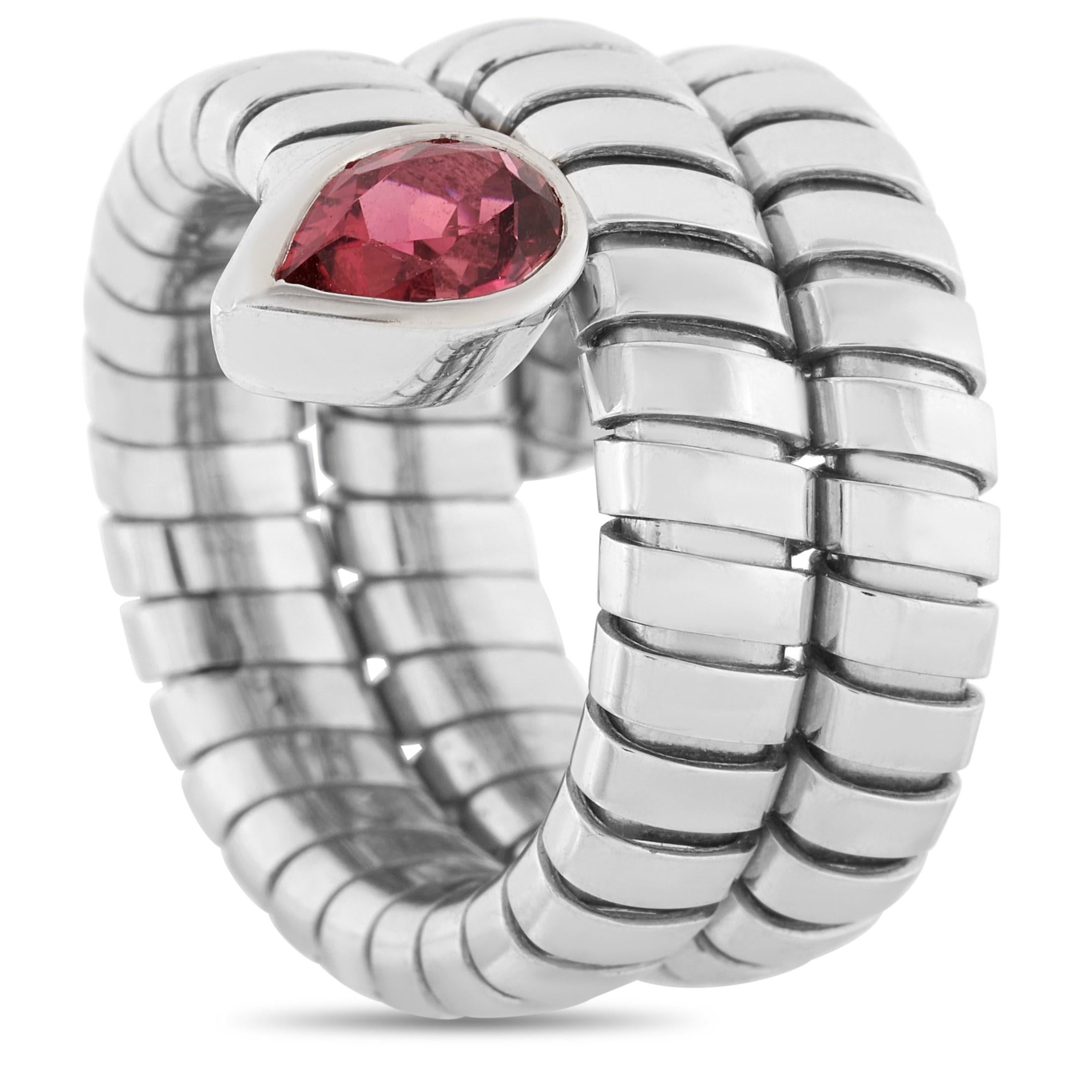 Bold, eye-catching, unique. The Bvlgari Serpenti Tubogas 18K White Gold Tourmaline Snake Ring ticks all the boxes for a statement ring. The 19mm thick band features a shapely coil of white gold rings dotted at one end with a pear-shaped pink