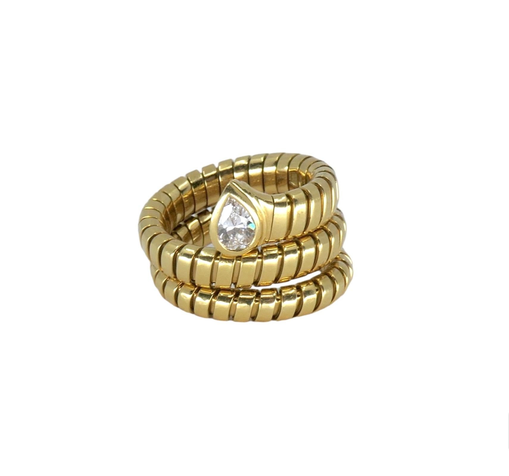 DESIGNER: Bulgari
CIRCA: 1990’s
MATERIALS: 18K Yellow Gold
GEMSTONE: 0.40 cts. Diamond
WEIGHT: 16.1 grams
RING SIZE: 6.75 - 7.5
HALLMARKS: BVLGARI, 750, Made in ITALY, *2337AL

A beloved Serpenti Tubogas rign by Bulgari, made of 18k gold, features a