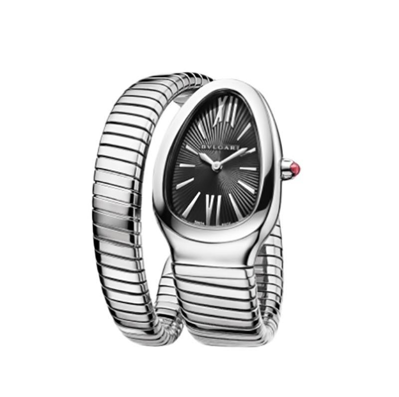 Serpenti Tubogas Lady watch, 35 mm stainless steel curved case, stainless steel crown set with a cabochon cut pink rubellite, black opaline dial with guilloché soleil treatment, single spiral stainless steel bracelet. Quartz movement, hours and