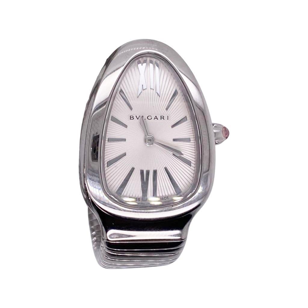 RETAIL PRICE: $8,550.00 + TAX        BRILLIANCE PRICE: $7,800.00

Pristine condition Serpenti Tubogas Lady watch, 35 mm stainless steel curved case, stainless steel crown set with a cabochon cut pink rubellite , silver opaline dial with guilloché