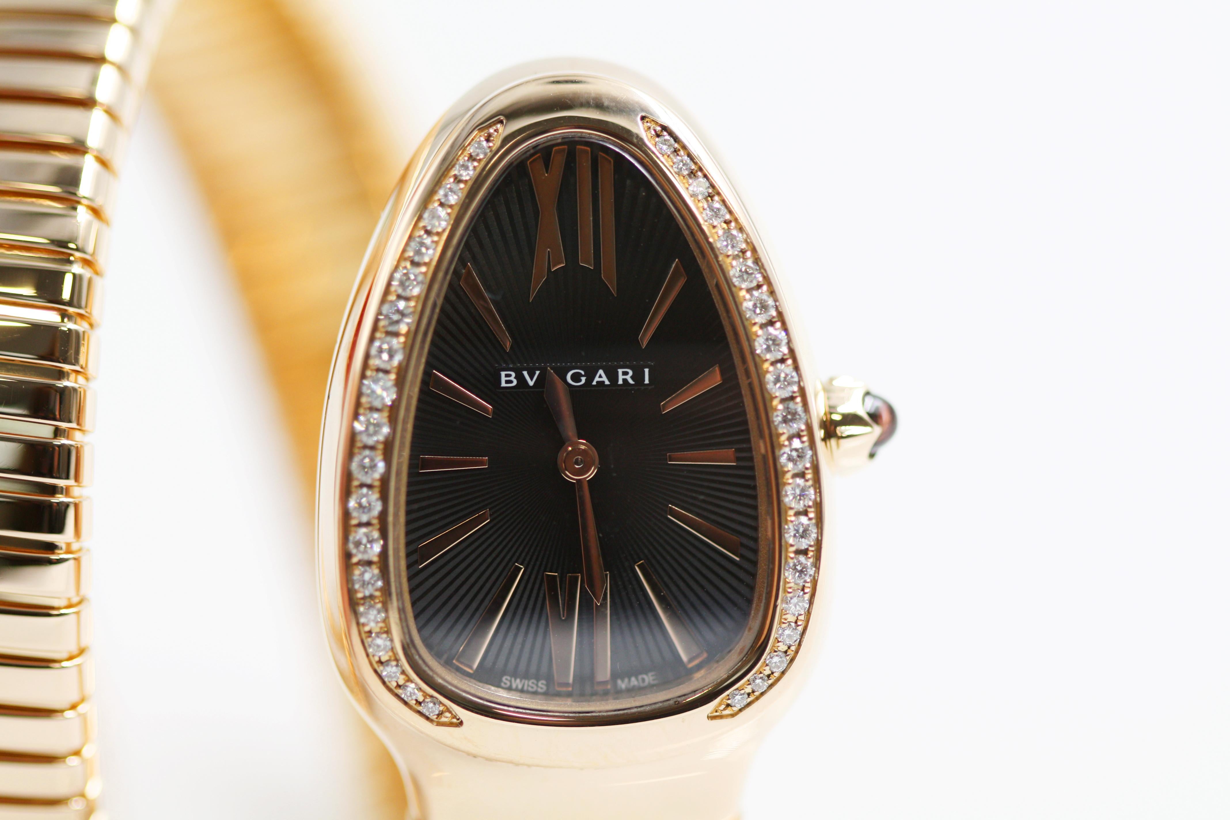 Serpenti Tubogas double spiral watch with 18 kt rose gold case set with brilliant cut diamonds, black opaline dial and 18 kt rose gold bracelet.

Merging two of the most iconic symbols of Bulgari design, the Serpenti Tubogas watch coils the