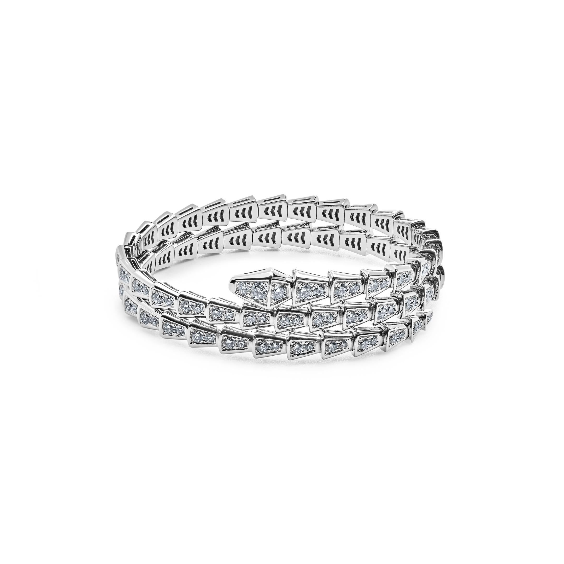 Experience the epitome of elegance with the BVLGARI Serpenti Two-Coil Bracelet in White Gold Diamond. This exquisite piece pays homage to the mesmerizing allure of the serpent, a symbol of seduction and sophistication. 

The bracelet features a