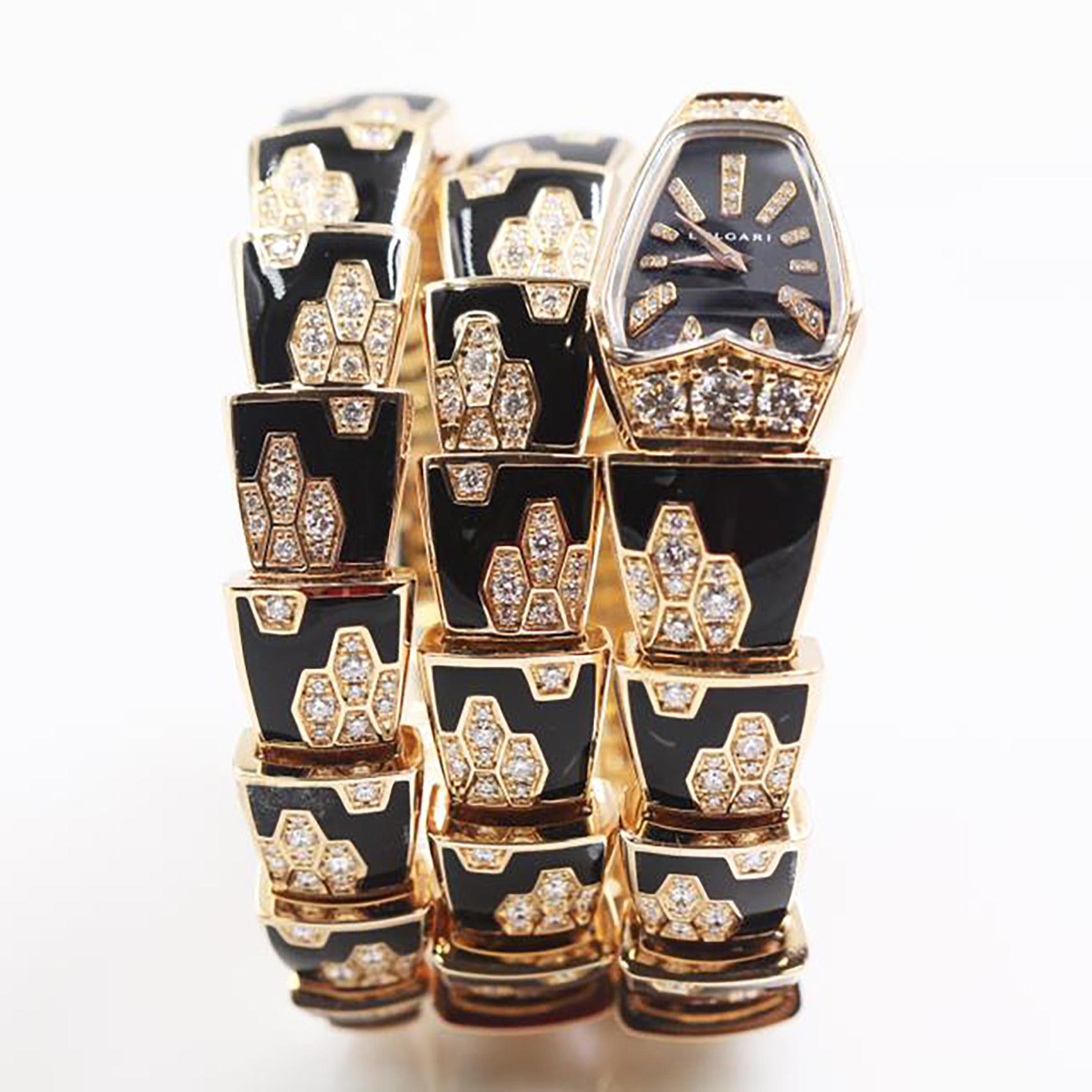 Brand: Bvlgari
Style: Twirl Bracelet / Watch
Model Name: Serpenti Scaglie
Model Number: SPP26BGD1GBLD1.2T
Case Material: 18k Rose Gold (Diamonds)
Case Size: 26mm
Movement: Quartz
Dial: Black Sapphire with Diamonds
Bracelet Material: 18k Rose Gold
