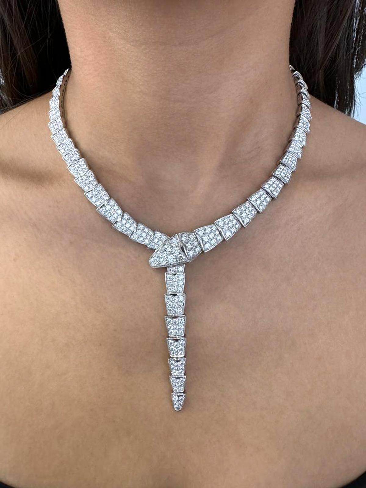 From the renowned Bvlgari of Italy, emerges a masterpiece from their Serpenti collection – an exquisite necklace meticulously crafted in 18-karat white gold. Prepare to envelop yourself in the radiant embrace of 14.74 carats of round brilliant-cut