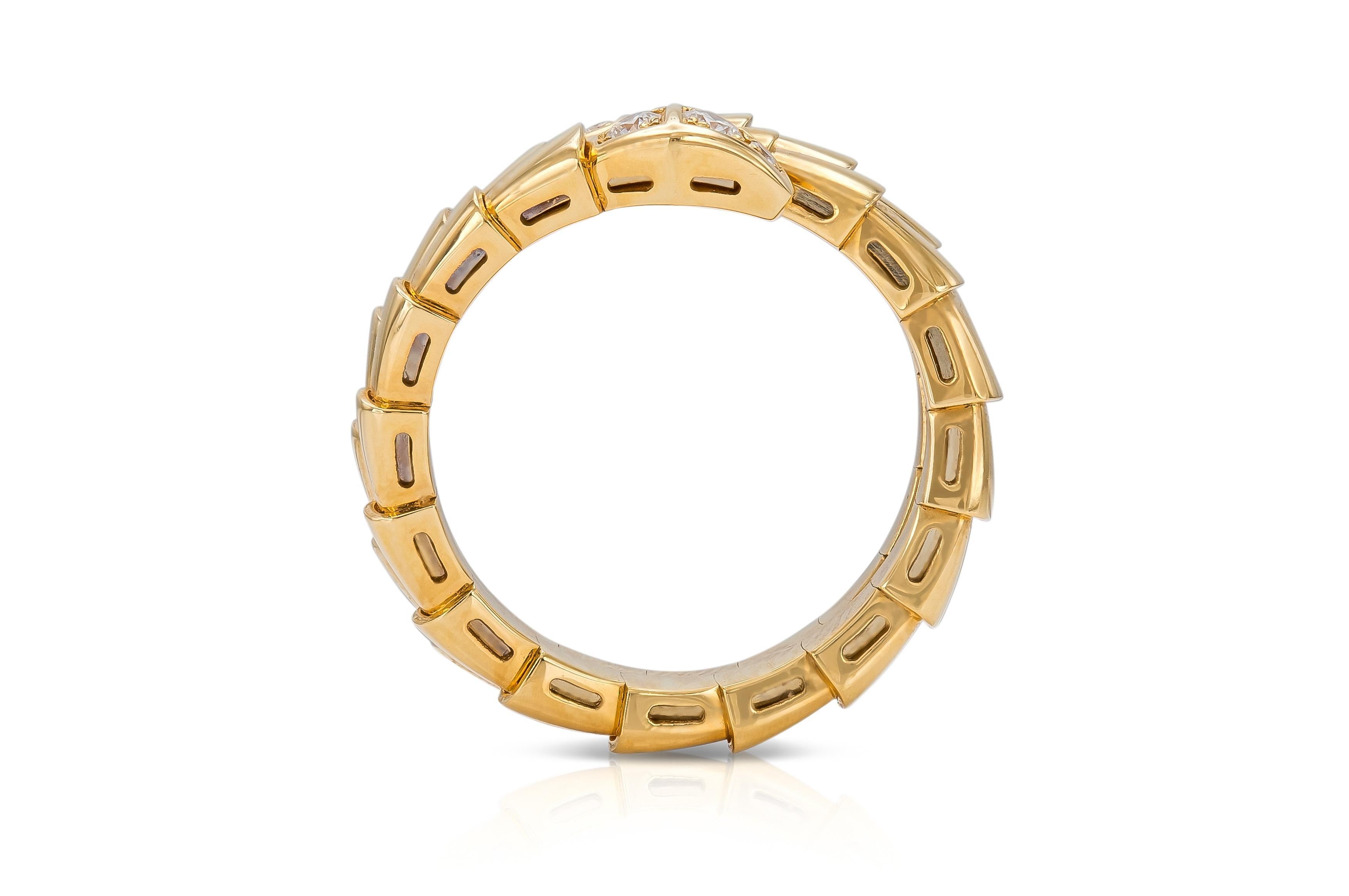 Finely crafted in 18k yellow gold with small Round Brilliant cut Diamonds.
Signed by Bvlgari, from their Serpenti collection
Size 6
Comes with its original box.