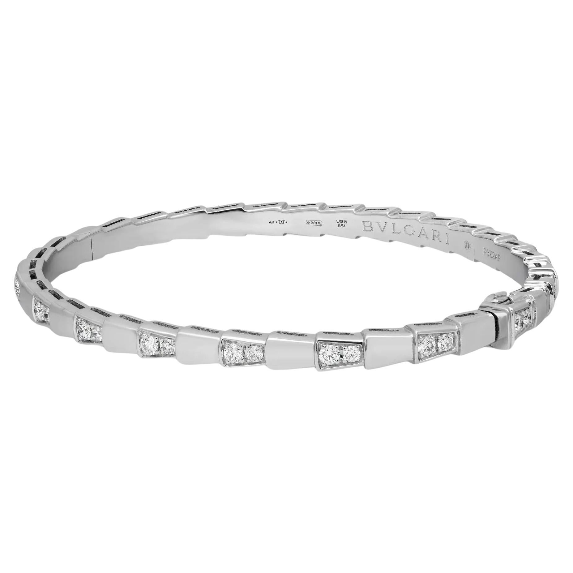 This bangle bracelet is a true statement of Bvlgari’s creative vision. Well crafted in 18K white gold. The bracelet is in the form of a serpent and beautifully alternates between high polish and diamond sections that evoke the viper's spiral move