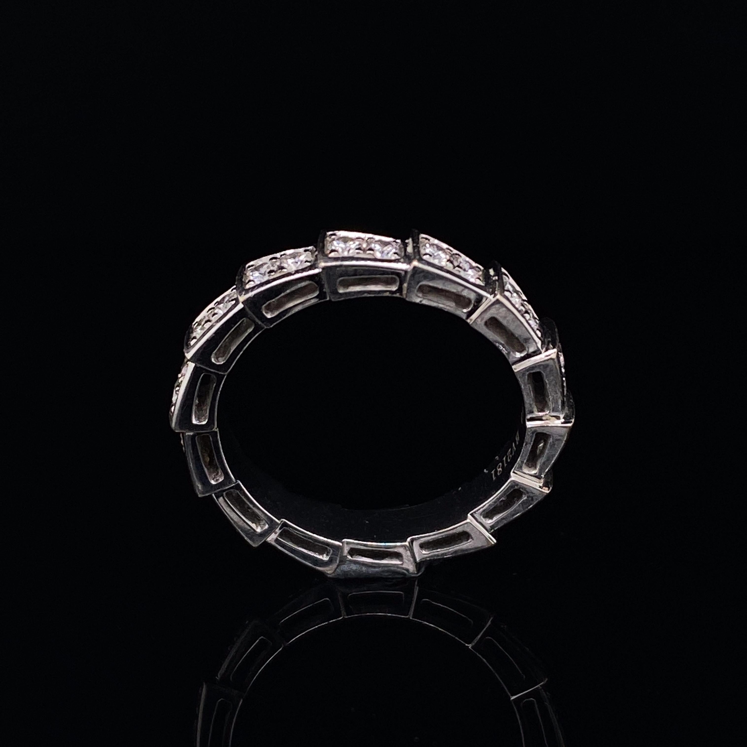 A Bvlgari Serpenti Viper diamond ring in 18 karat white gold.

This statement ring is pave set with round brilliant cut diamonds which coil around the finger mirroring both the scales and sinuosity of a snake. 
Comprised of fourteen individual