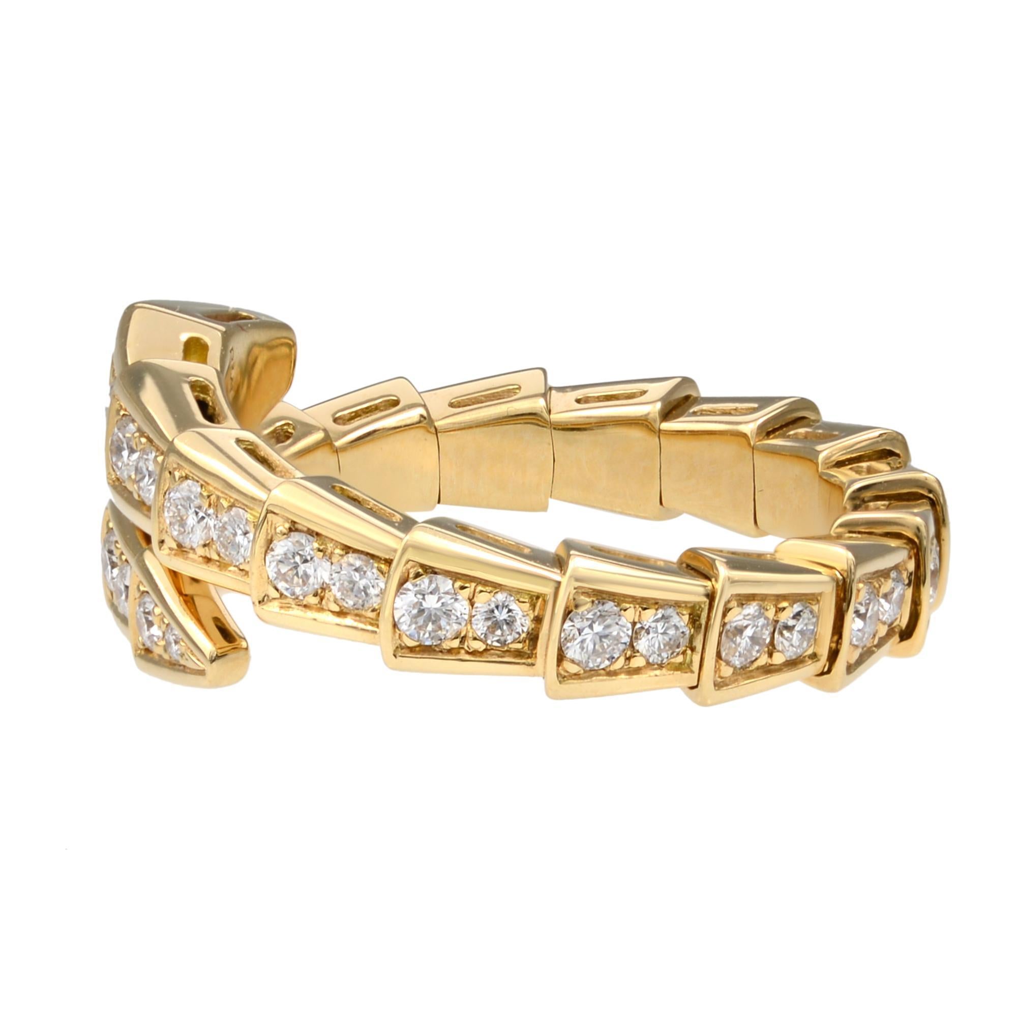 Bvlgari Serpenti Viper Round Cut Diamond Ring. This beautiful jewelry piece coils around the finger and stands out thanks to the precious beauty of the scales and the distinctive sinuosity of the snake. The ring is crafted in 18K yellow gold with