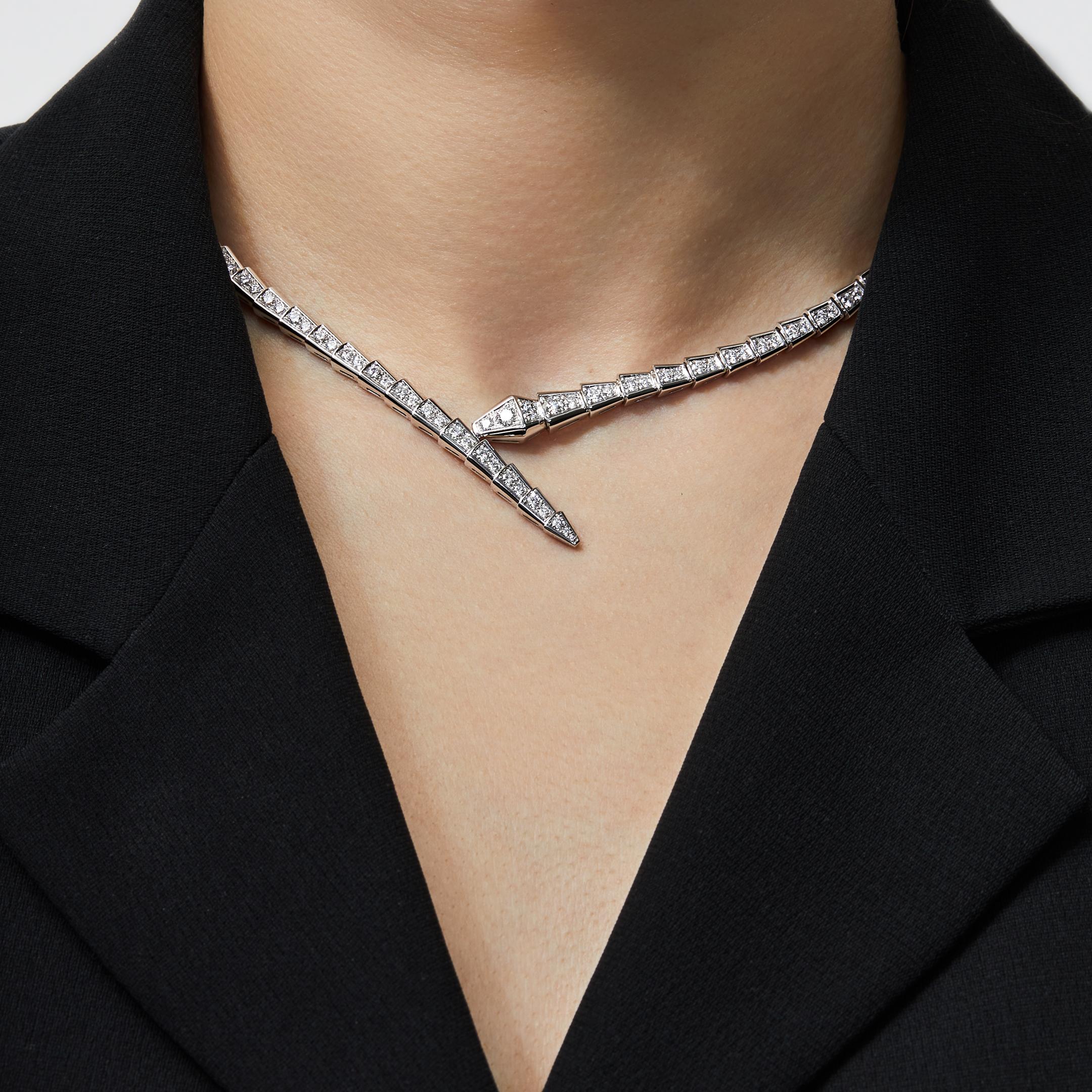 Introducing the captivating BVLGARI Serpenti Viper Necklace 360348 in White Gold, a stunning embodiment of seduction and glamour by Bulgari.

Crafted with exquisite attention to detail, this mesmerizing necklace celebrates the allure of the serpent,