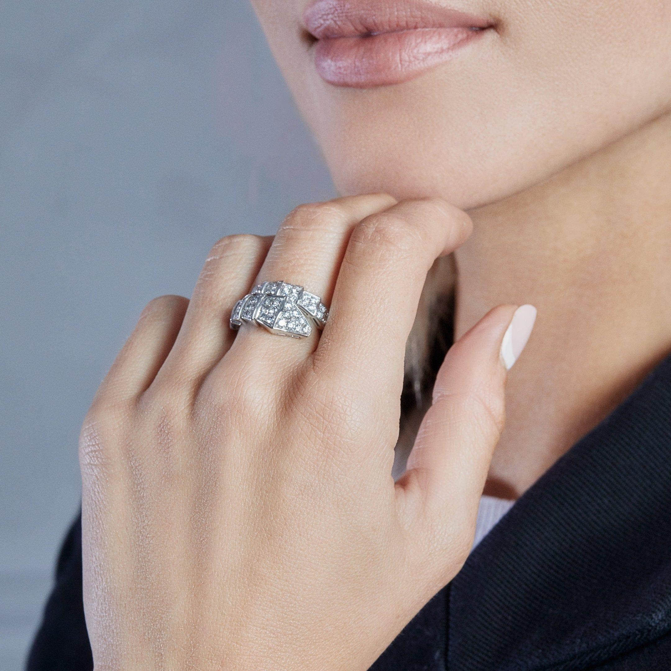 Introducing the mesmerizing BVLGARI Serpenti Viper One-Coil Ring in White Gold adorned with Pavé Diamonds, a symbol of sophistication and allure. Inspired by Bulgari's iconic spirit animal, this exquisite ring pays homage to the seductive power of