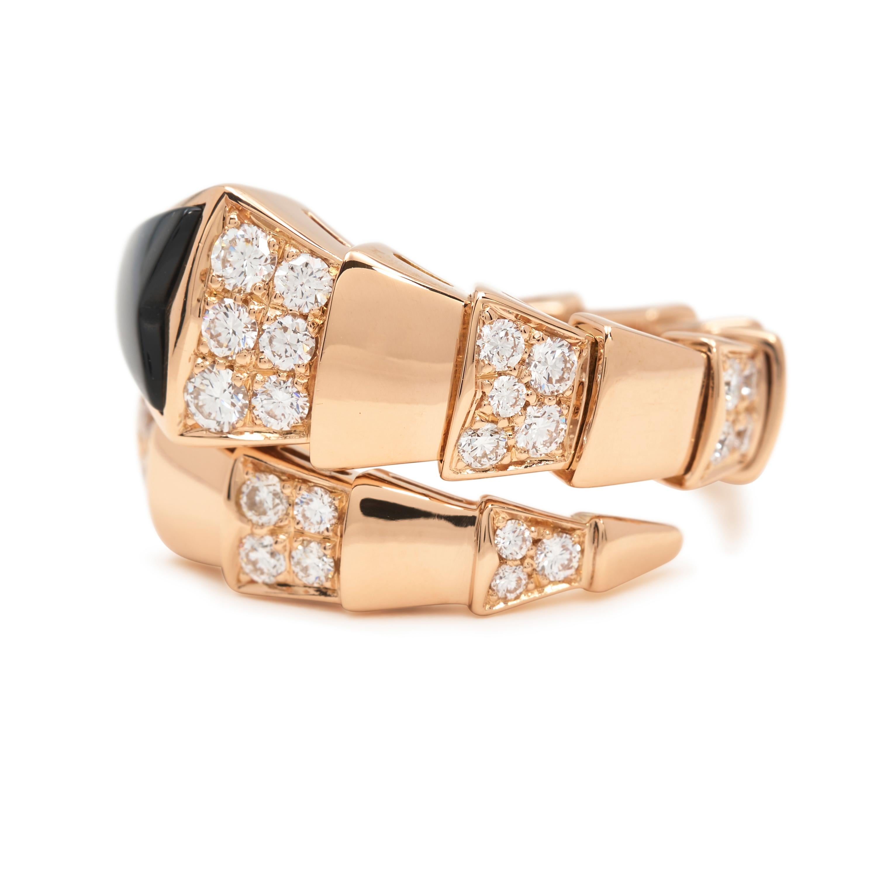 Authentic Bvlgari Serpenti Viper ring crafted in 18-karat rose gold. The serpentine design coils around the finger and features pavé set diamonds of an estimated .83 total carats on alternating scales. The ring is finished with a carved onyx head.