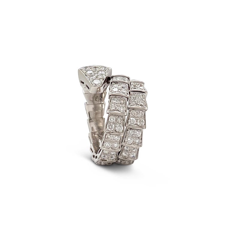 Authentic Bvlgari 'Serpenti Viper' ring crafted in 18 karat white gold. The striking serpentine design coils twice around the finger featuring scales and a snake head that are pavé set with an estimated 2.77 carats of round brilliant cut diamonds