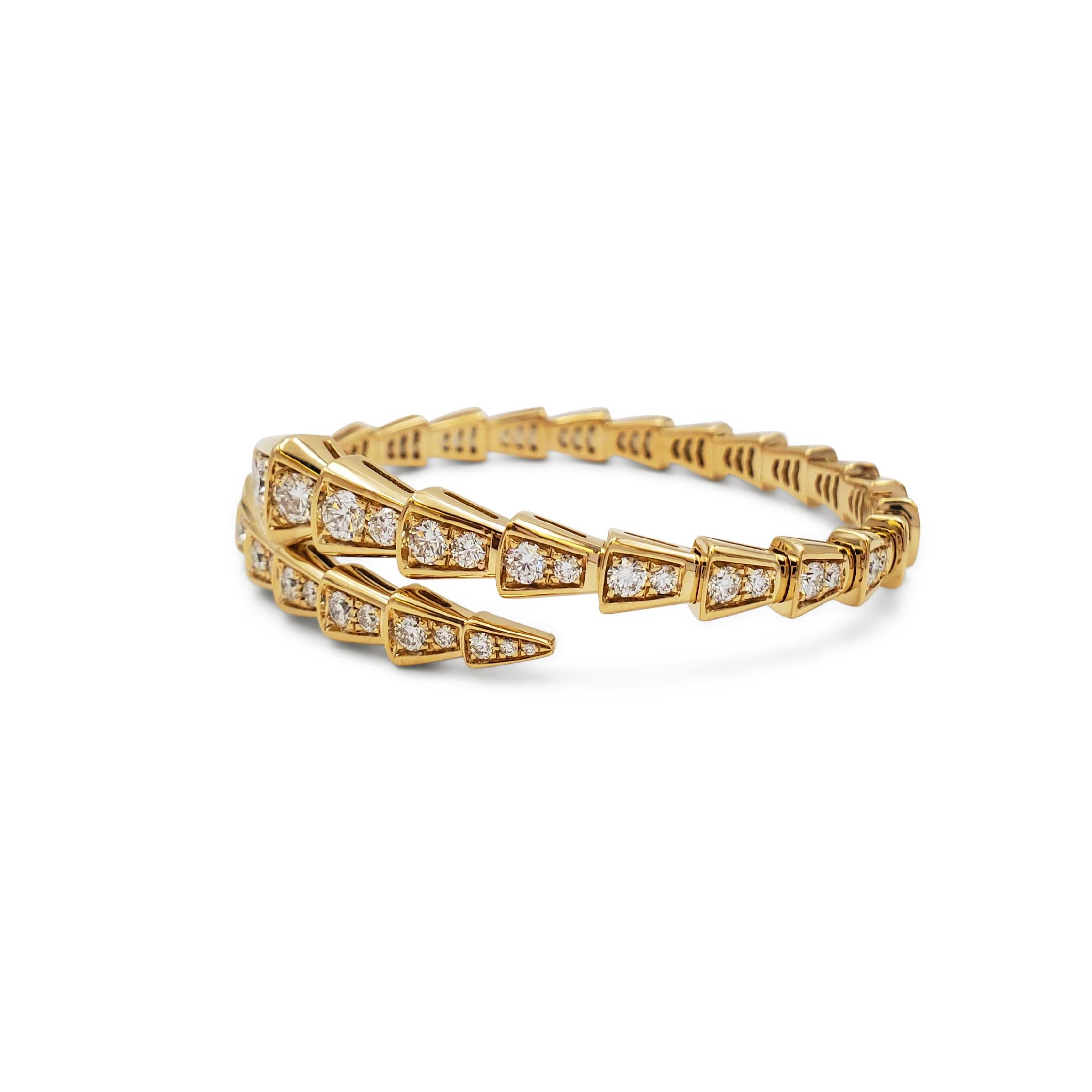 Authentic Bvlgari Serpenti Viper bracelet crafted in 18 karat yellow gold and pavé set with approximately 2.8 carats of sparkling round brilliant cut diamonds.  Size S (15cm).  Signed Bvlgari, made in Italy, Au750, with serial number and hallmark. 