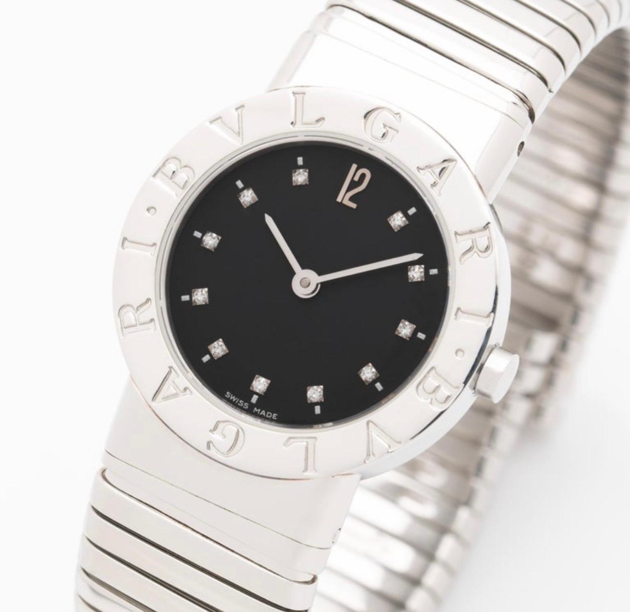 Stunning stainless steel, Bvlgari serpentine, watch with diamond hour markers. These timeless iconic watches are perfect for every day, where we’re dressing up in the evening the watch keeps perfect time and just had his battery replaced. But it’s
