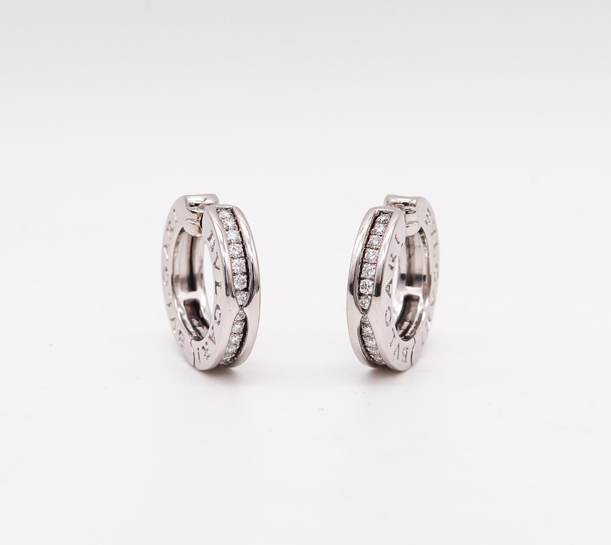 Bvlgari Signatures B Zero Huggie Earrings In 18Kt White Gold With VS Diamonds In Excellent Condition For Sale In Miami, FL