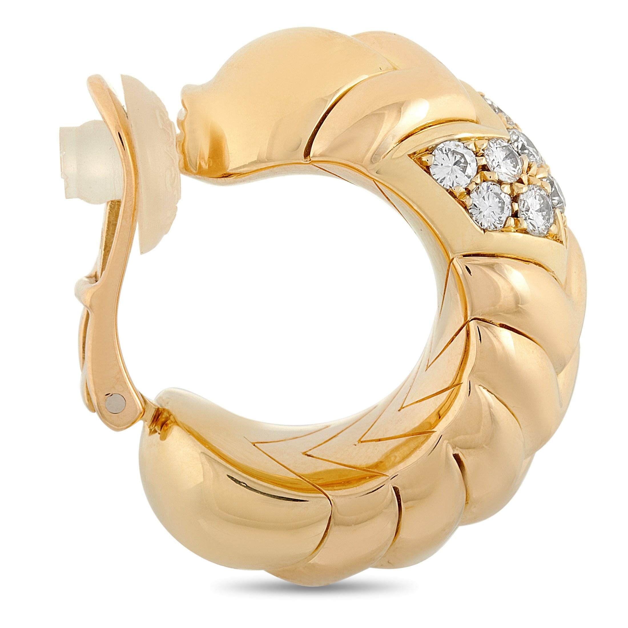 The Bvlgari SPIGA earrings are top-notch pieces of jewelry. They are crafted from 18 karats yellow gold and embellished with 1.27 carats diamond with grade E color and VVS clarity. The earrings each weigh 14.95 grams each and measure 1 by 0.44