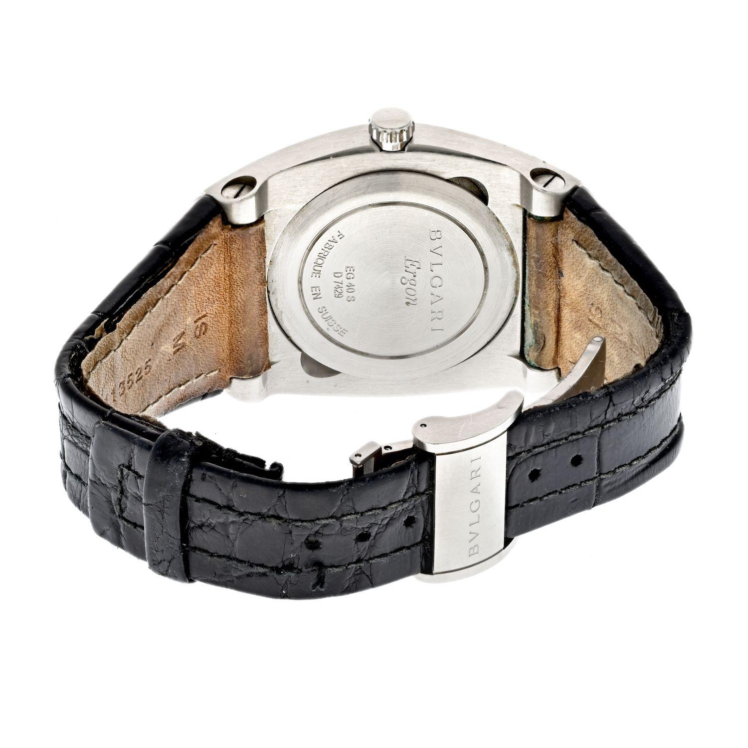 Stainless steel Bulgari sport Ergon 35 S is a center second self-winding date watch with a steel deployant clasp. The 35mm x 44mm curved tonneau-shape case has a solid back, hooded lugs with Bulgari logo, sapphire crystal, black dial with luminous