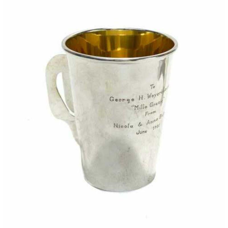Bvlgari sterling silver handled cup from Nicola Bulgari

Bvlgari sterling silver and gilt interior handled cup. The cup is a gift from Nicola and Anna Bulgari to George H. Weyerhaeuser, 