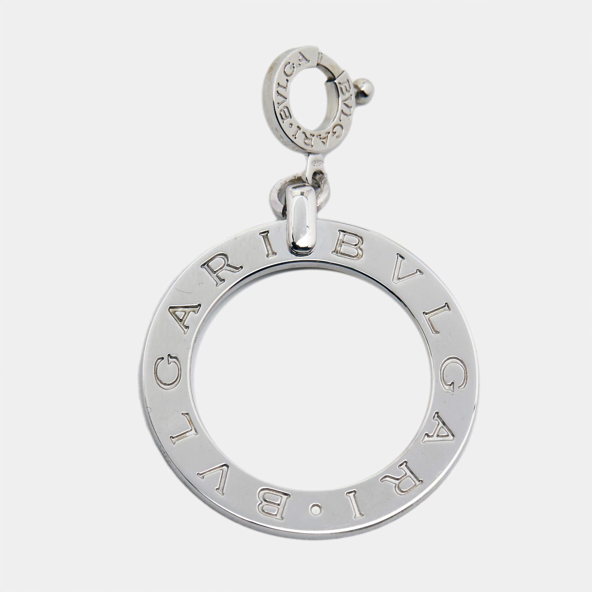 The Bvlgari charm is an exquisite jewelry piece. Crafted from 925 sterling silver, it features the iconic Bvlgari logo engraved on its surface. This charm is versatile, adding a touch of elegance and luxury to any bracelet or necklace.

Includes: