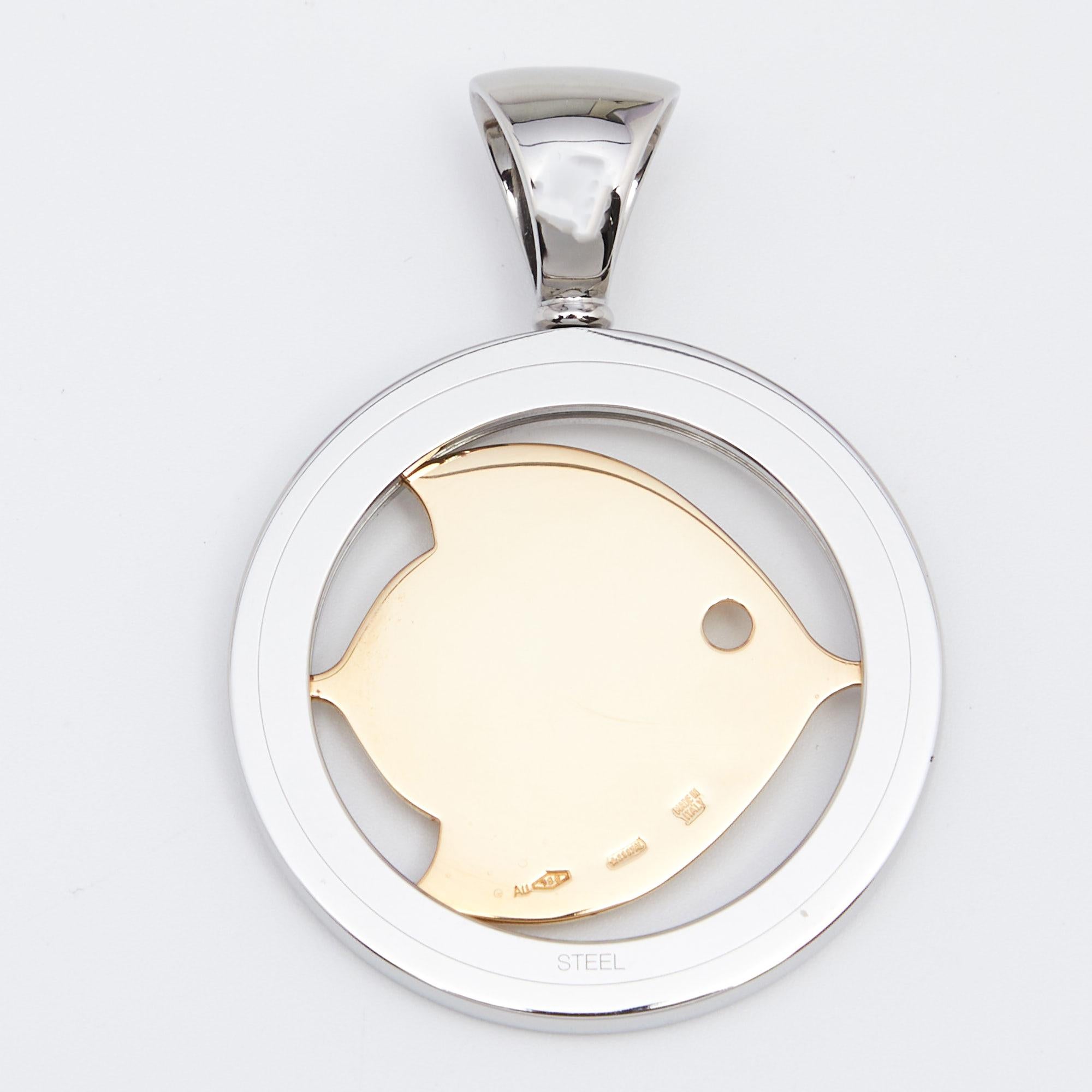 Weighing 11.91 grams, this pendant from Bvlgari is versatile as it comes with a bail that allows you to attach it to chains and cords. It has been crafted from stainless steel in a circular shape and added with an 18k yellow gold fish motif and logo