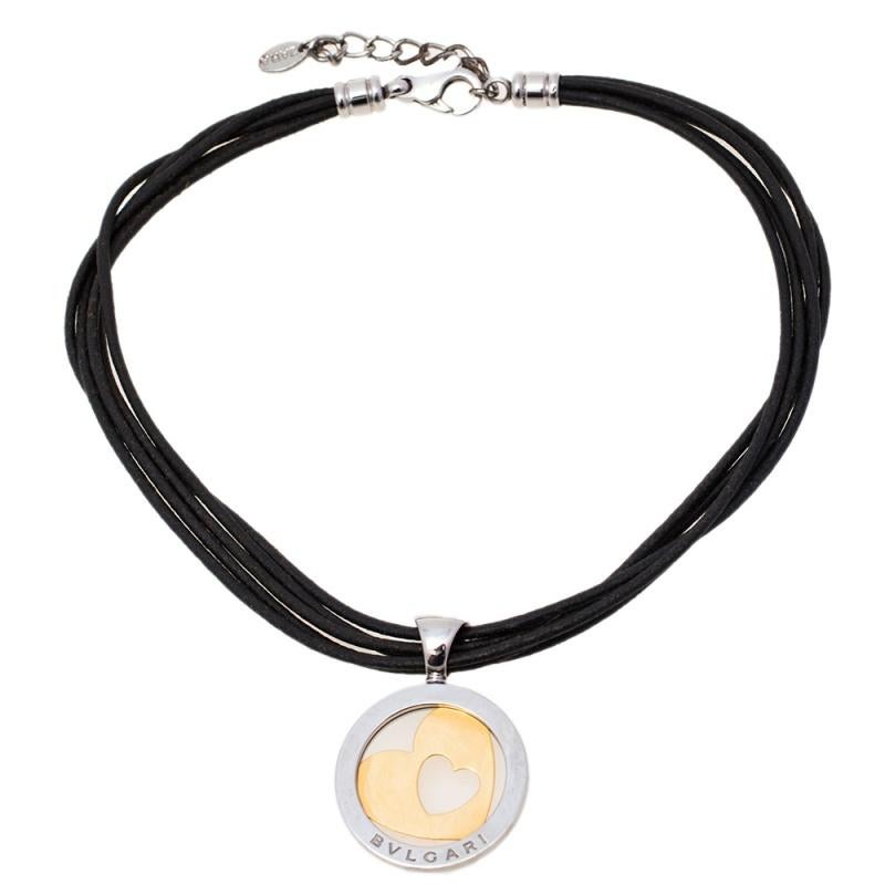 For times when you fancy a slightly edgy look over an elegant appearance, Bvlgari brings you this stunning Tondo Heart necklace that has a circular stainless steel pendant with an 18k yellow gold heart within it. The pendant is strung by multiple