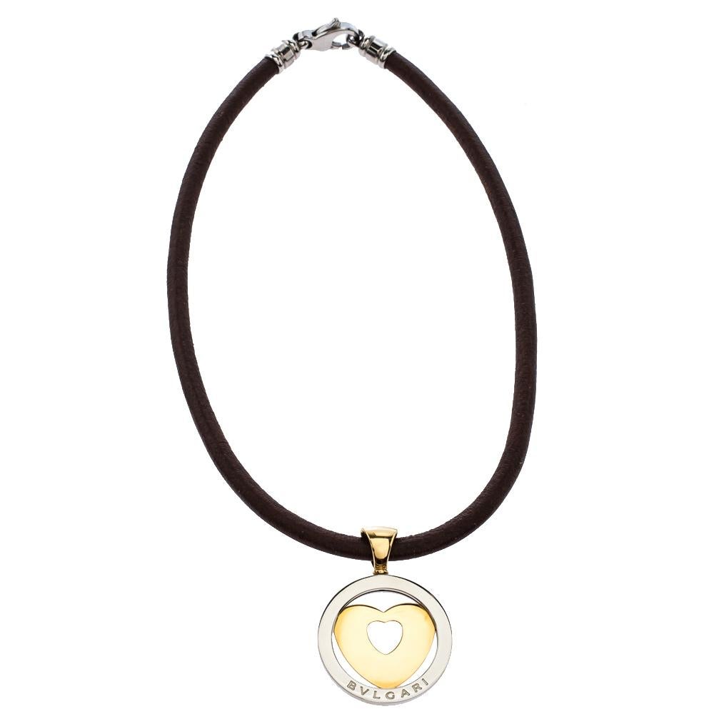 This beautiful necklace from Bvlgari comes with a cord and an 18k yellow gold and stainless steel heart shape pendant. The pendant comes with signature detailing and a cut-out heart at the centre that lends it a unique look.

