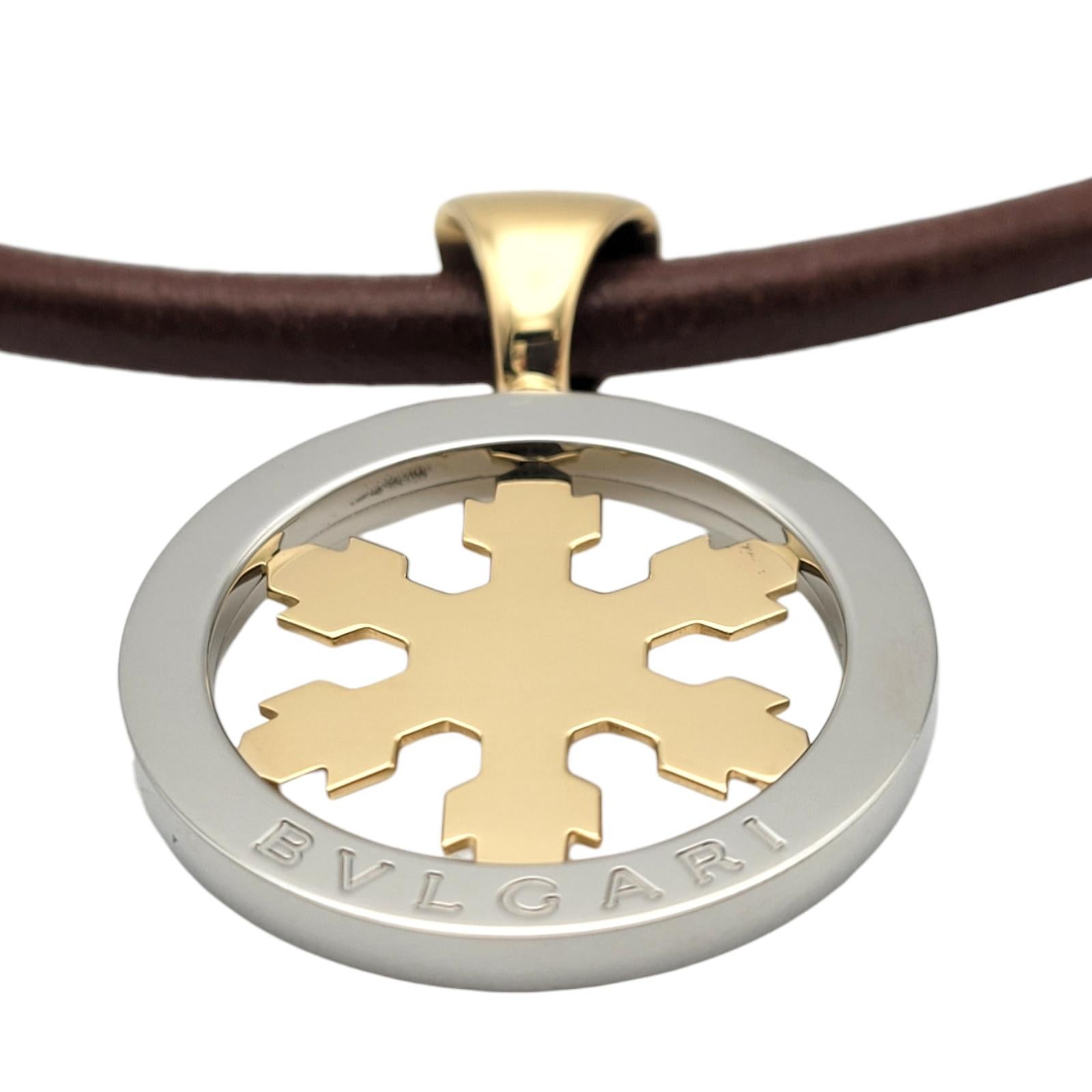 Elevate your style with this stunning Bulgari Tondo Snowflake Leather Necklace in 18K Yellow Gold & Stainless Steel. Crafted with meticulous attention to detail, this necklace is a true masterpiece of elegance and sophistication.

The open circle