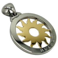 Bvlgari TONDO pendentif soleil en or et acier