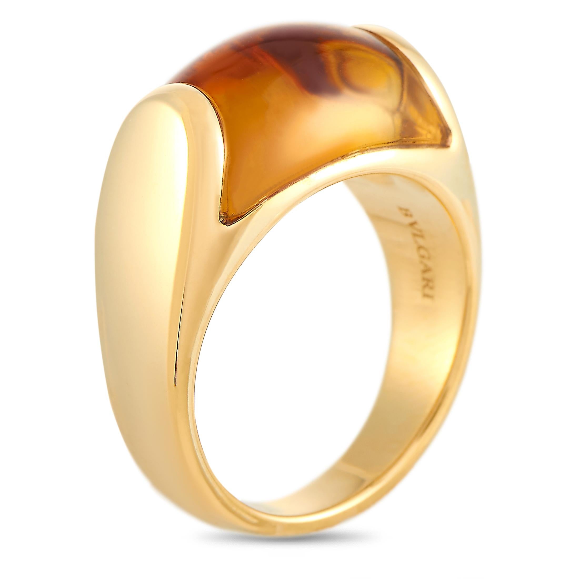The Bvlgari “Tronchetto” ring is made out of 18K yellow gold and citrine and weighs 7.6 grams. The ring boasts band thickness of 3 mm and top height of 7 mm, while top dimensions measure 9 by 14 mm.
 
 This item is offered in estate condition and